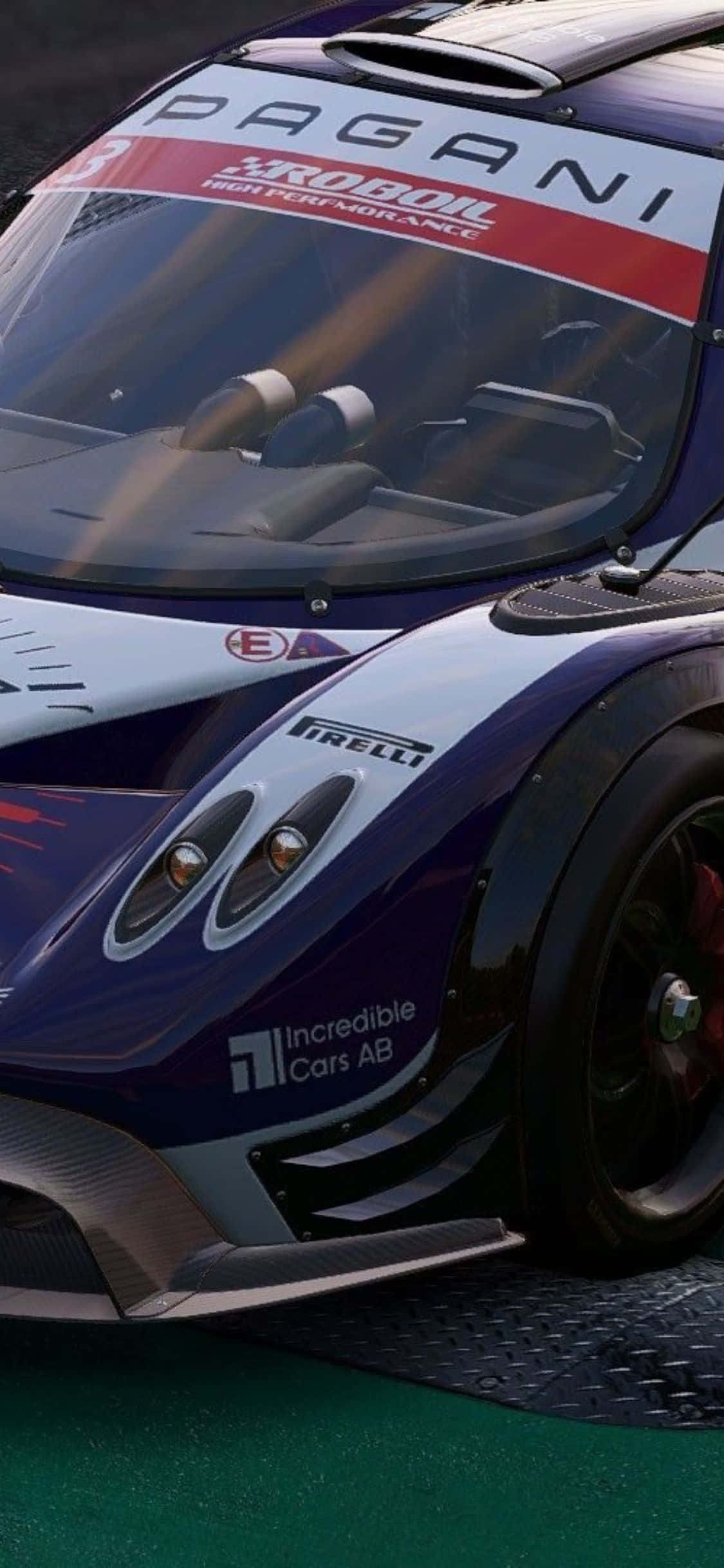 iPhone Xs Project Cars 桌布 壁紙 — 綠色賽道表面上，配備倍耐力輪胎的時尚藍白Pagani賽車特寫。
