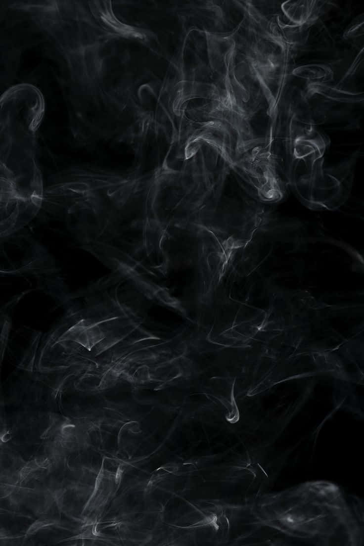 Black Smoke 桌布 壁紙 — 縹緲的白煙縷縷，在深邃的黑色虛空中飄逸捲曲，營造出神秘的抽象質感。