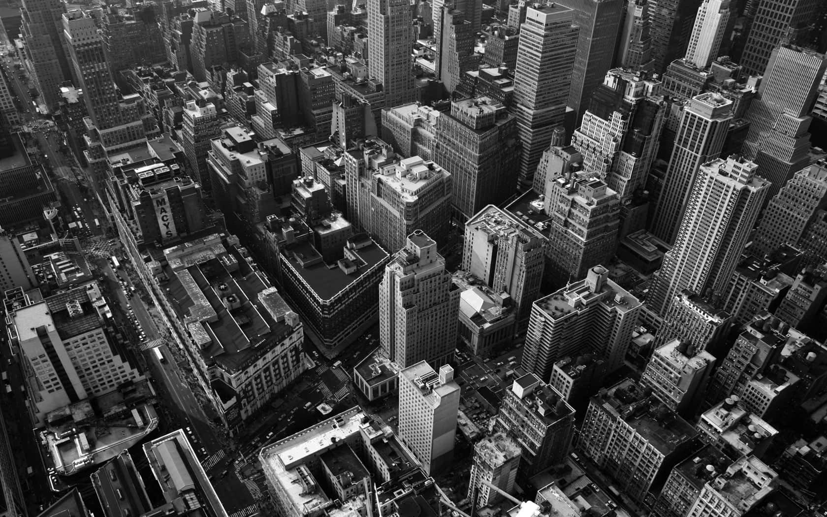 Black And White Cityscape 桌布 壁紙 — 繁華大都市中密集摩天大樓和街道的黑白鳥瞰圖。