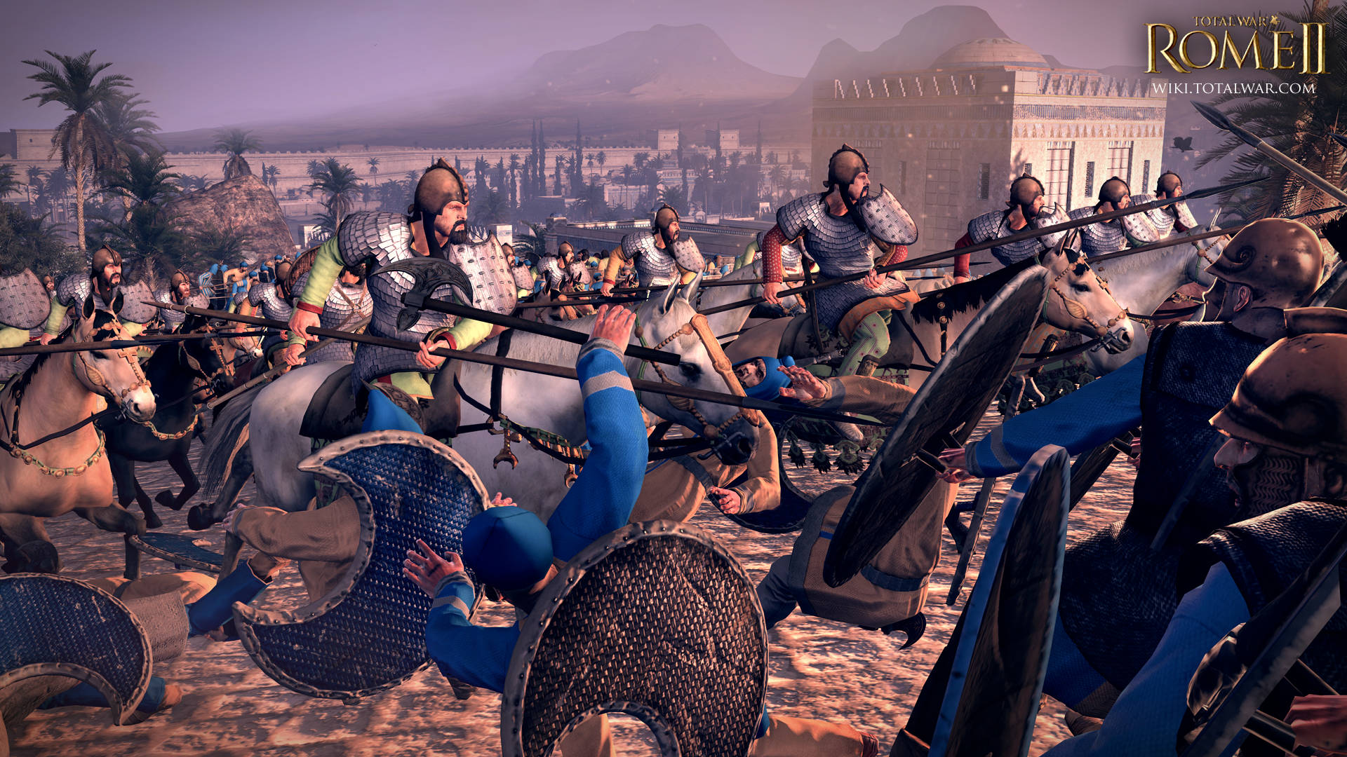 電玩遊戲 桌布 壁紙 — 羅馬騎兵在沙漠地形中衝鋒，來自《Total War Rome II》的混亂戰鬥場景。
