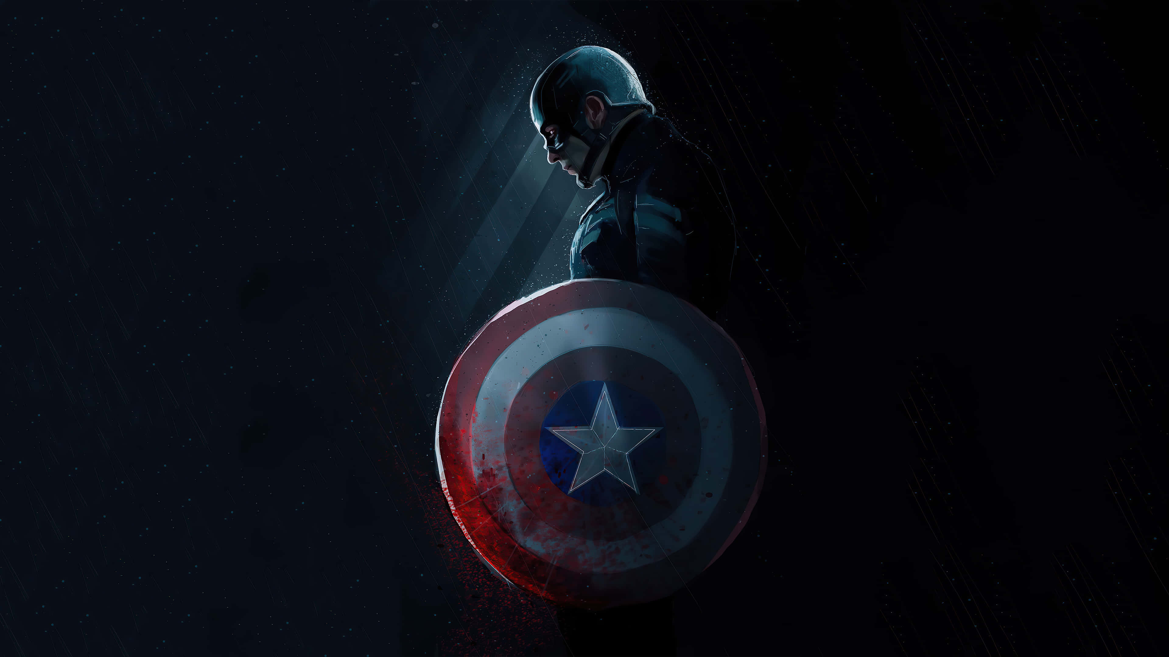 Captain America Desktop 桌布 壁紙 — 美國隊長在雨中站立，在聚光燈下舉著盾牌，背景黑暗。
