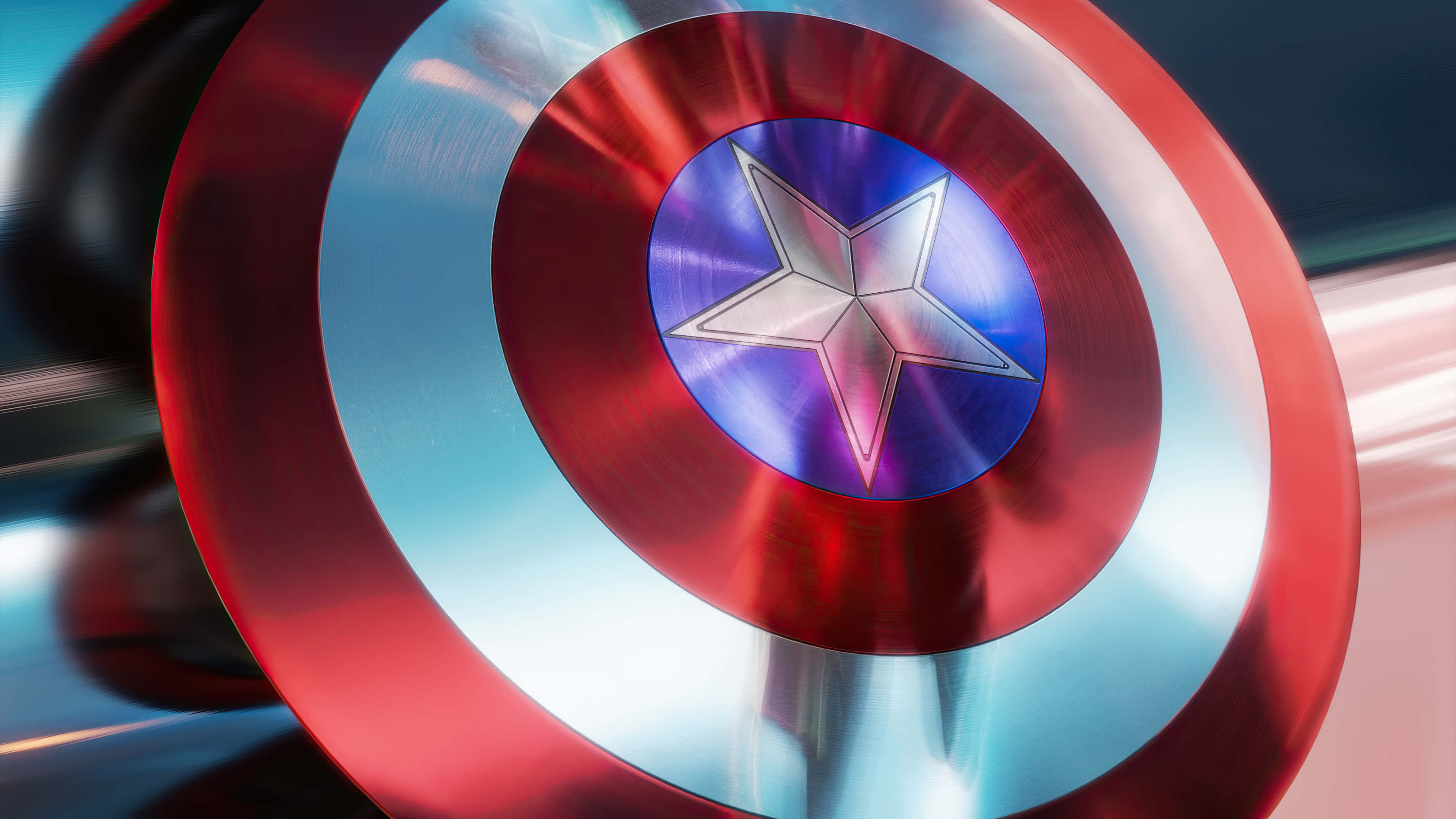 Marvel Aesthetic 桌布 壁紙 — 美國隊長標誌性盾牌的特寫，帶有紅、白、藍同心圓和一個閃爍金屬光澤的銀色星星。
