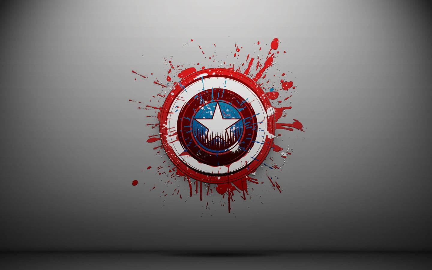 Marvel Captain America 桌布 壁紙 — 美國隊長的盾牌在漸變灰色背景上爆出紅色油漆飛濺。