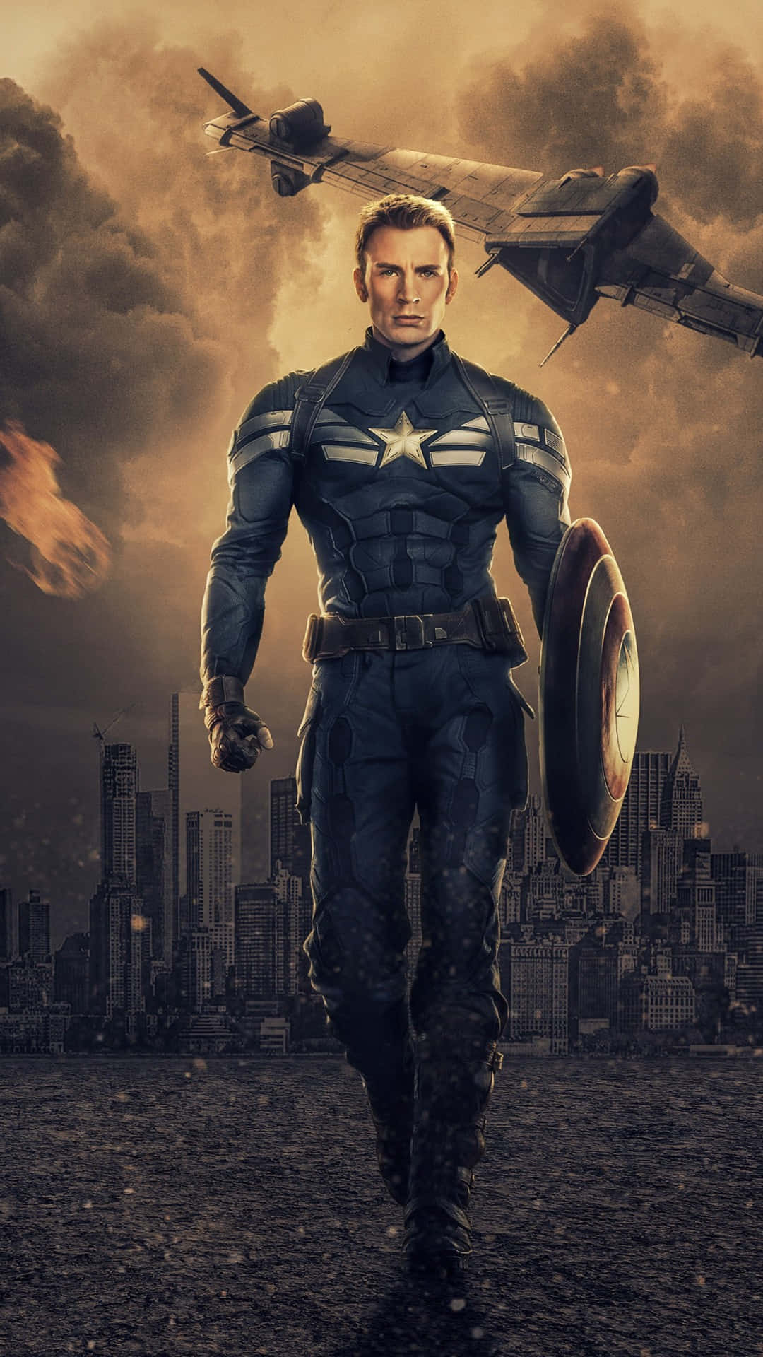 Captain America Desktop 桌布 壁紙 — 美國隊長穿著標誌性的藍色戰衣，手持盾牌向前邁進，一架戰機在煙霧瀰漫的城市天際線上飛過。