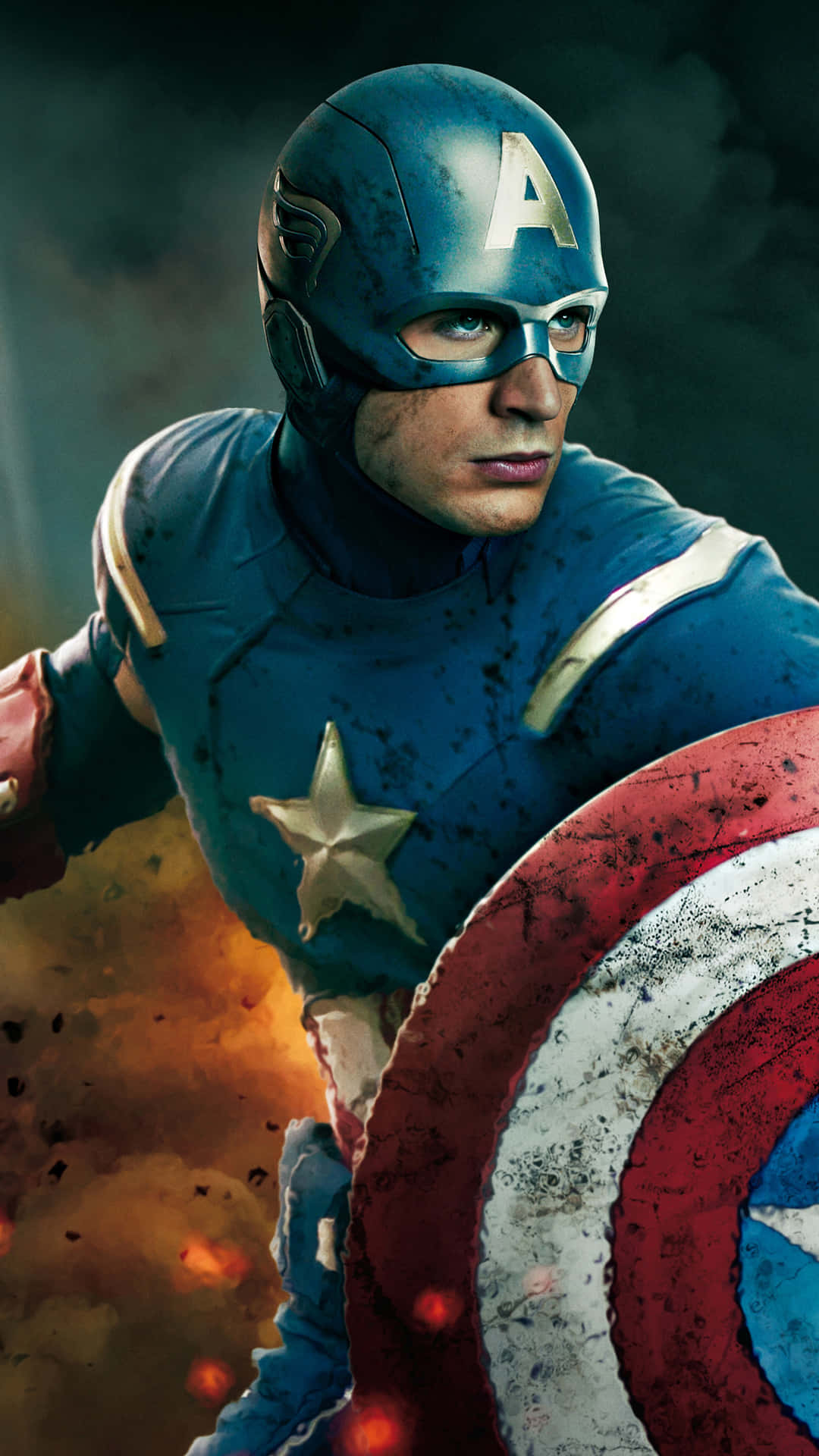 Captain America Cool 桌布 壁紙 — 美國隊長身穿戰鬥裝備，在熾熱爆炸和煙霧中舉起他標誌性的盾牌。