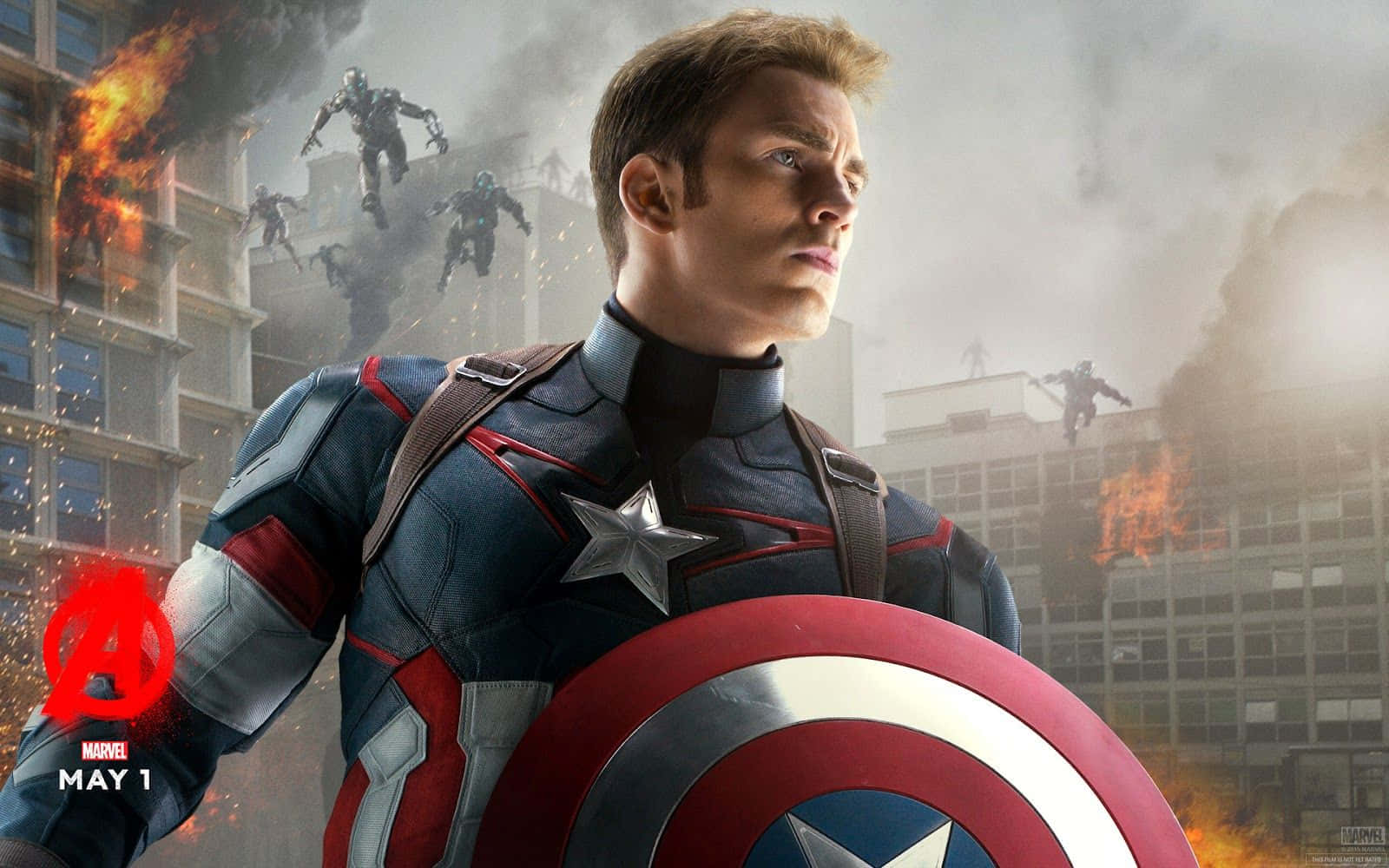 Best Captain America 桌布 壁紙 — 美國隊長身穿戰鬥裝備，堅定地手持標誌性盾牌，身後燃燒的爆炸和敵人的身影襲擊著崩塌的城市景觀。