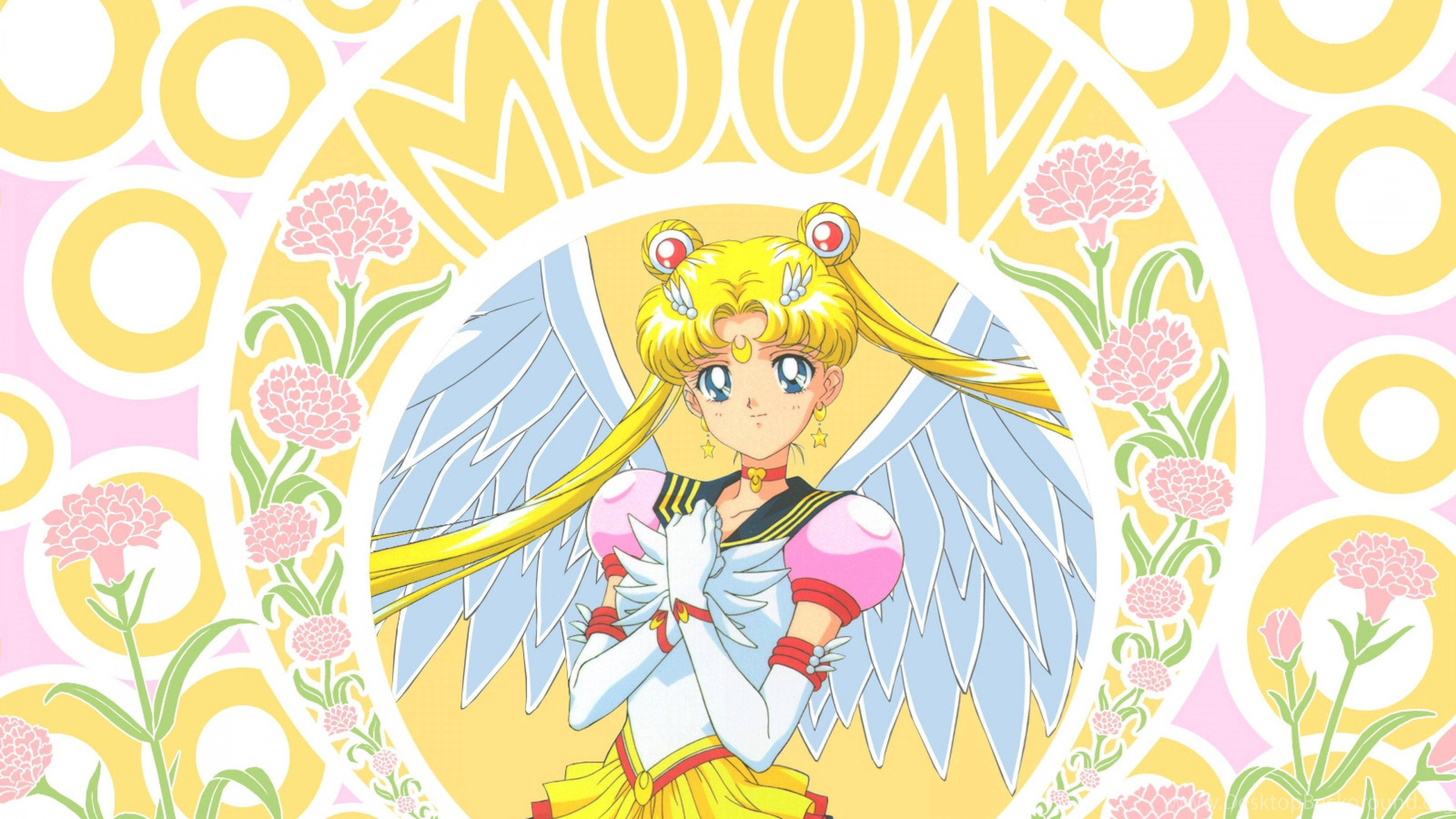 美少女戰士 桌布 壁紙 — 美少女戰士Sailor Moon 展開天使翅膀，站在花卉和圓形圖案的背景前，色彩鮮豔柔和。