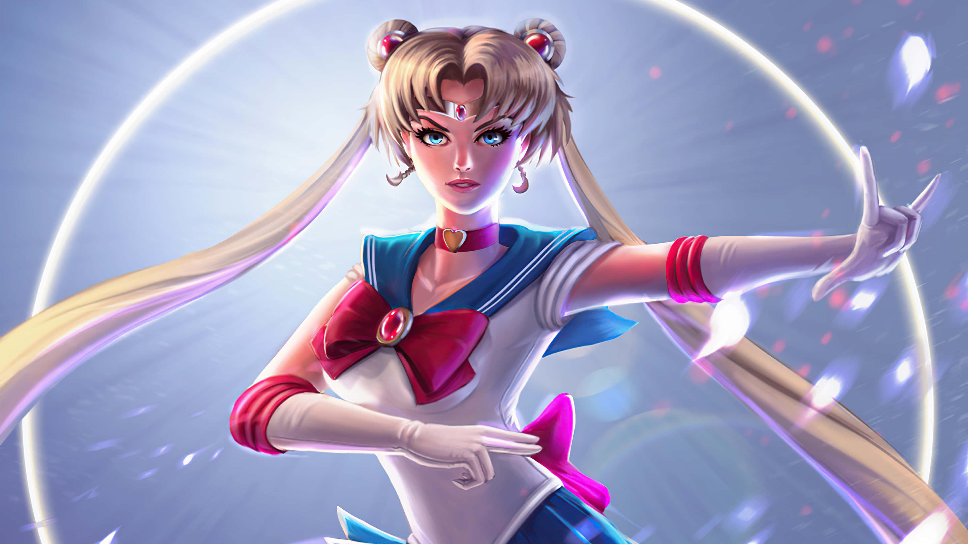美少女戰士 桌布 壁紙 — 美少女戰士英勇地站在發光的圓環中，頭髮飄逸，周圍有閃爍的粒子。