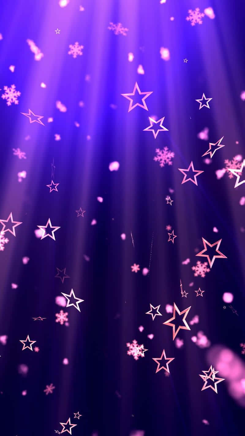 Stars 桌布 壁紙 — 耀眼的紫色光束穿透墜落的粉紅色星星和雪花，營造出神奇的發光場景。