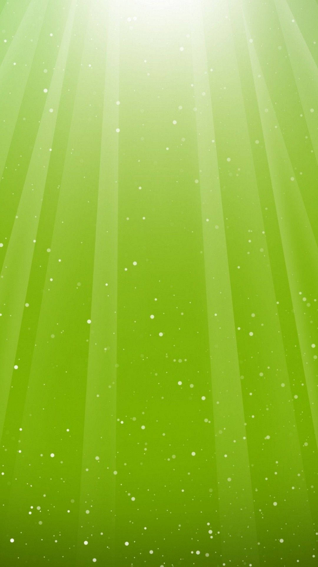 Green Phone 桌布 壁紙 — 耀眼的綠色光束穿透漂浮在寧靜漸變背景中的粒子。