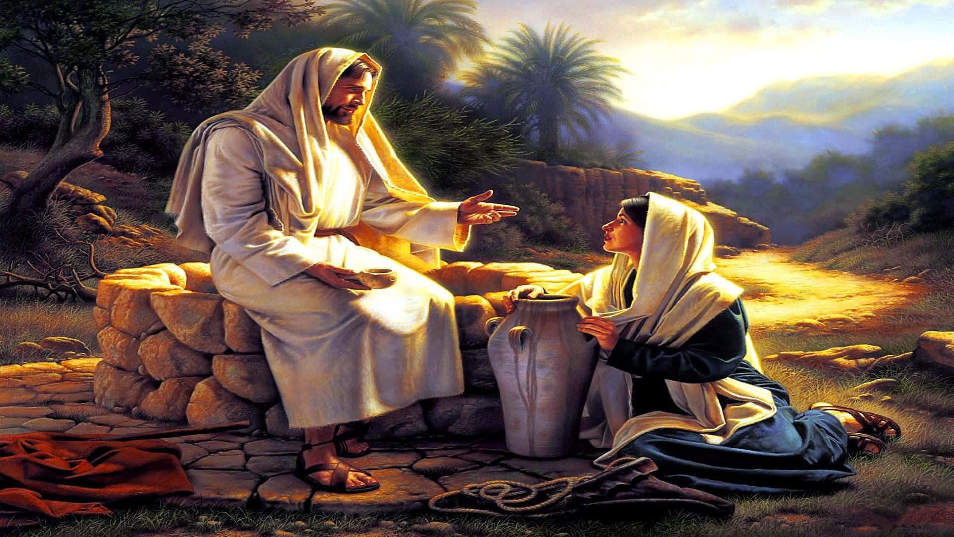 Religious Art 桌布 壁紙 — 耶穌坐在石牆上，對一個跪在大陶罐旁邊的女人說話，背景是陽光明媚的沙漠景觀，有棕櫚樹和遠山。