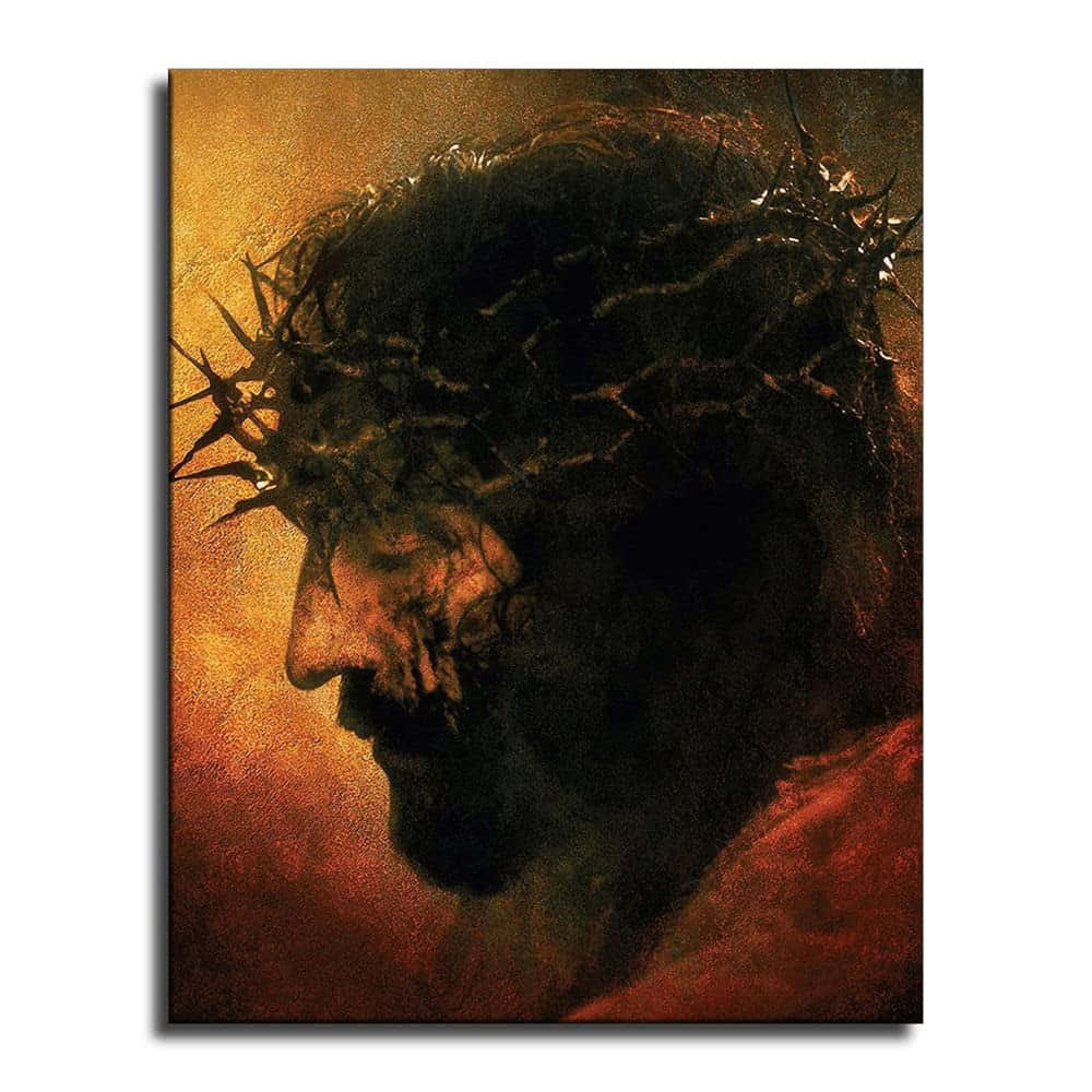 Jesus Crown Of Thorns 桌布 壁紙 — 耶穌戴著荊棘冠冕的莊嚴側面，背景是溫暖的金色和紅色紋理。