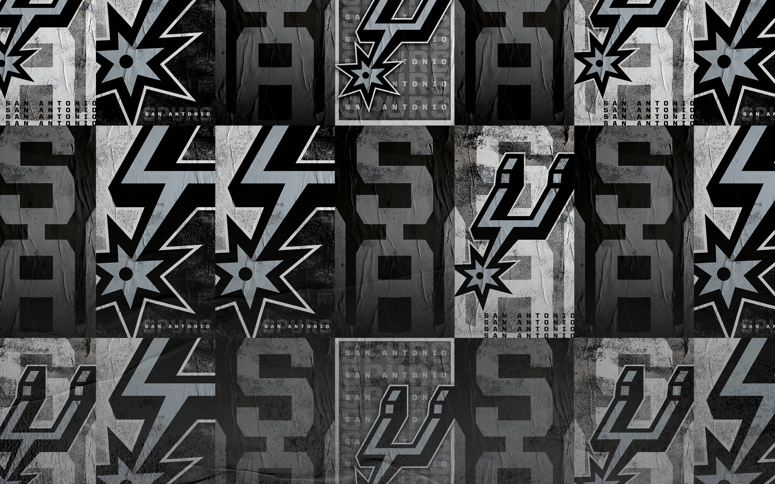 Spurs 桌布 壁紙 — 聖安東尼奧馬刺隊標誌的單色重複圖案，帶有磨損紋理和褪色文字疊加。