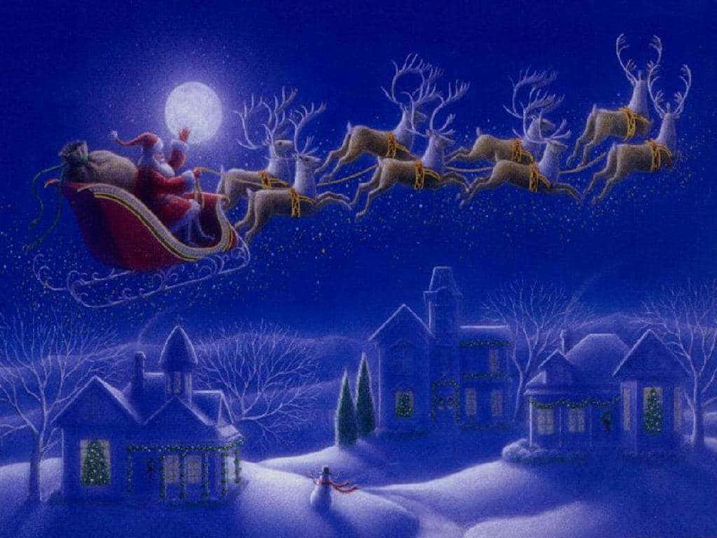 Santa Claus 桌布 壁紙 — 聖誕老人乘坐由馴鹿拉動的紅色雪橇，在冬夜的滿月下飛越積雪覆蓋的房屋。