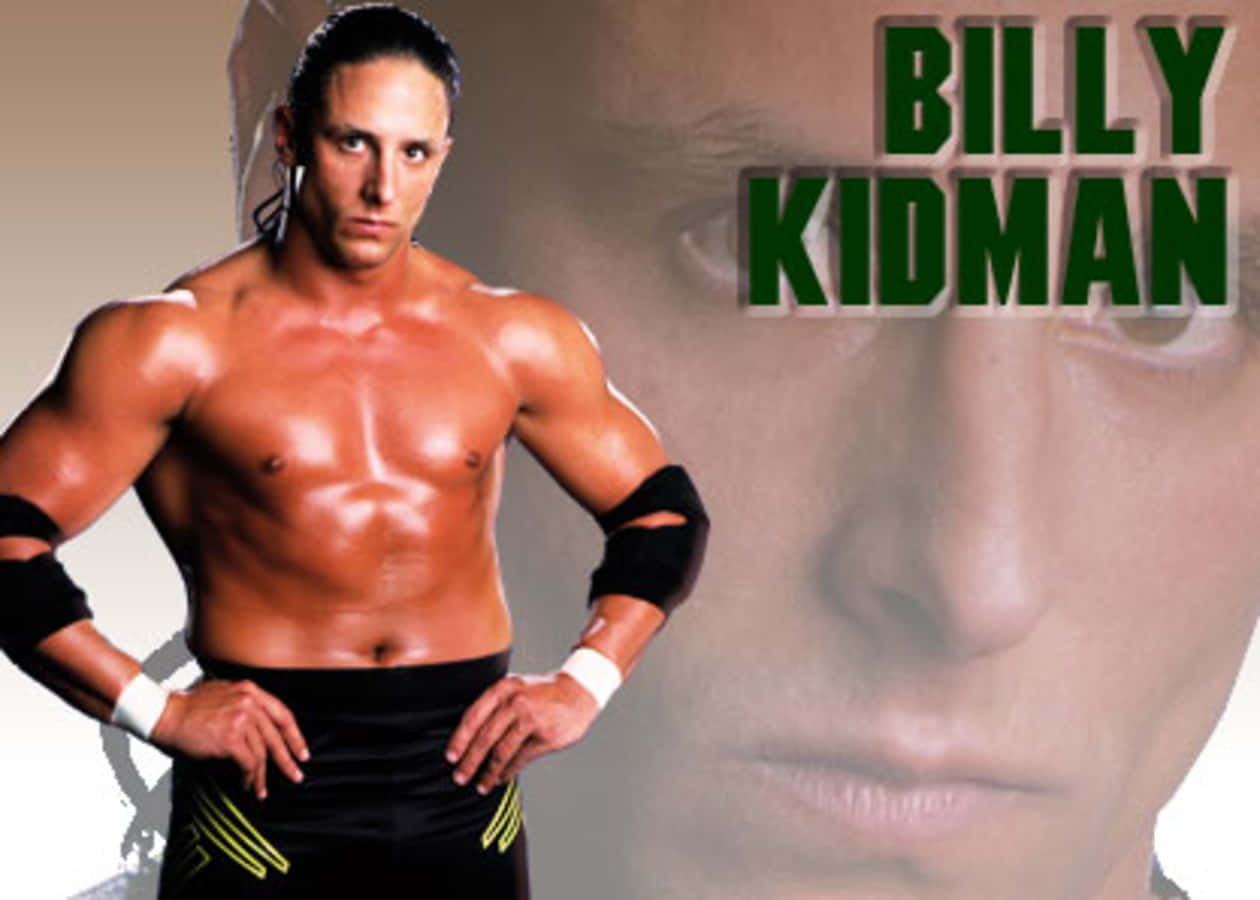 WWE 桌布 壁紙 — 肌肉發達的摔角手 Billy Kidman 自信地雙手叉腰，背景是他模糊的臉部特寫和粗體綠色文字。