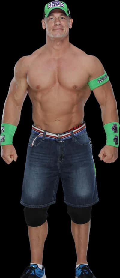 WWE 桌布 壁紙 — 肌肉發達的摔角手約翰·希南自信地穿著牛仔短褲和綠色腕帶，站在黑色背景前。