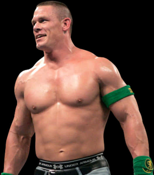 WWE 桌布 壁紙 — 肌肉發達的摔角手約翰·希南自信地站在黑色背景前，戴著綠色腕帶和Under Armour短褲。