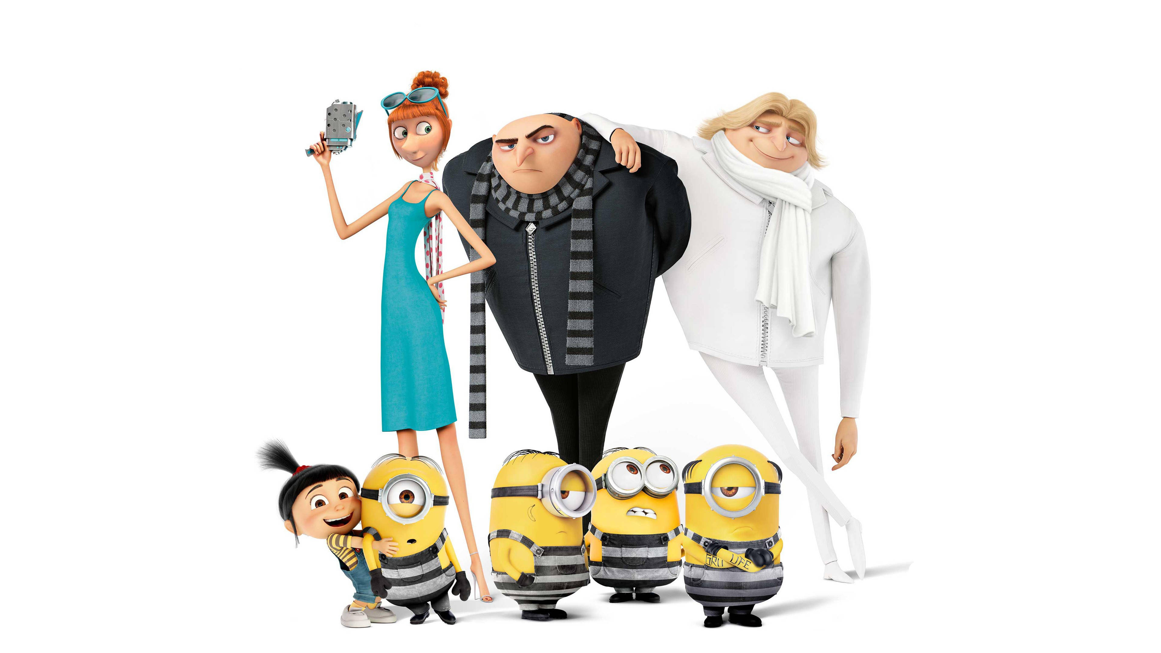 Despicable 桌布 壁紙 — 脾氣暴躁的格魯和他的小小兵在鮮明的動畫場景中，拿著自拍棒在純白背景前擺姿勢。