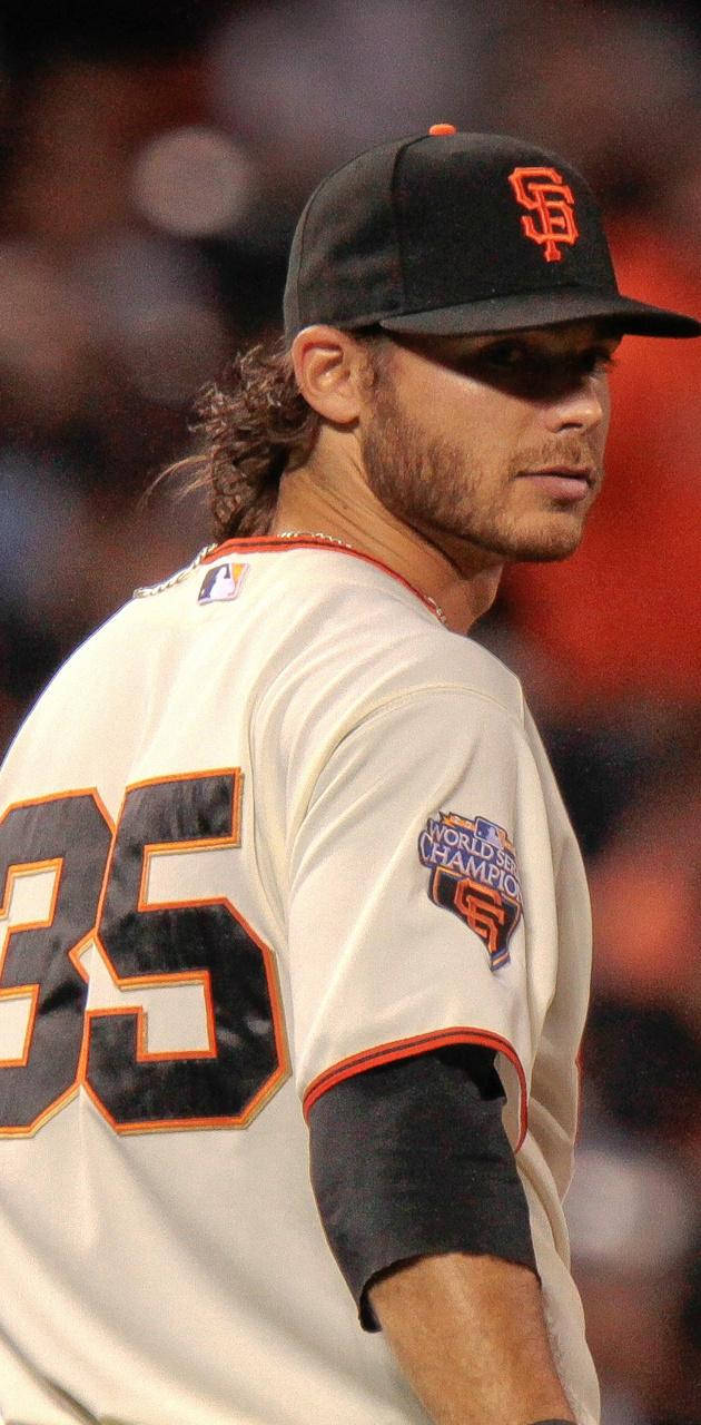 San Francisco Giants 桌布 壁紙 — 舊金山巨人隊球衣的棒球選手近照，號碼35，附有世界大賽冠軍臂章。