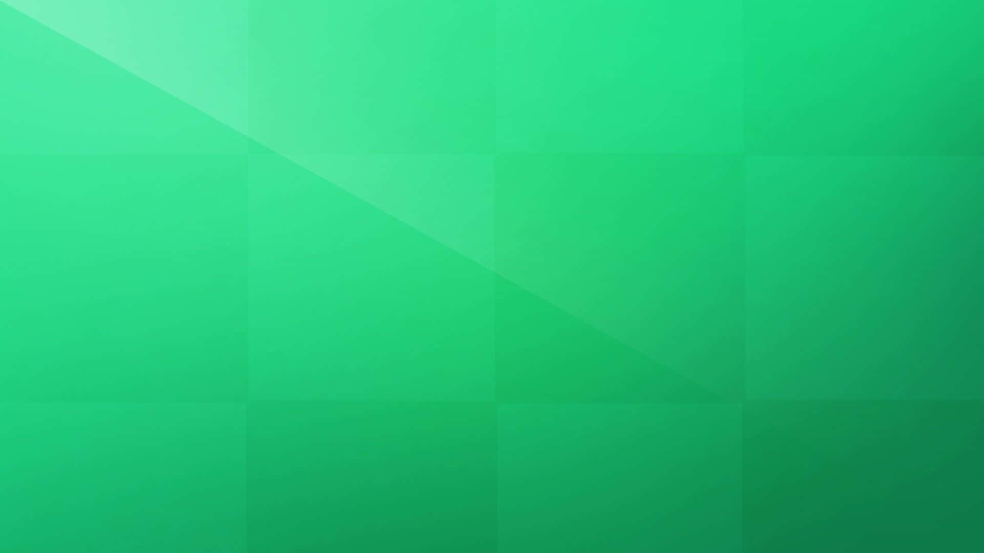 純色動圖 桌布 壁紙 — 舒緩的漸變綠色背景，帶有柔和的幾何面板和對角線光線點綴。
