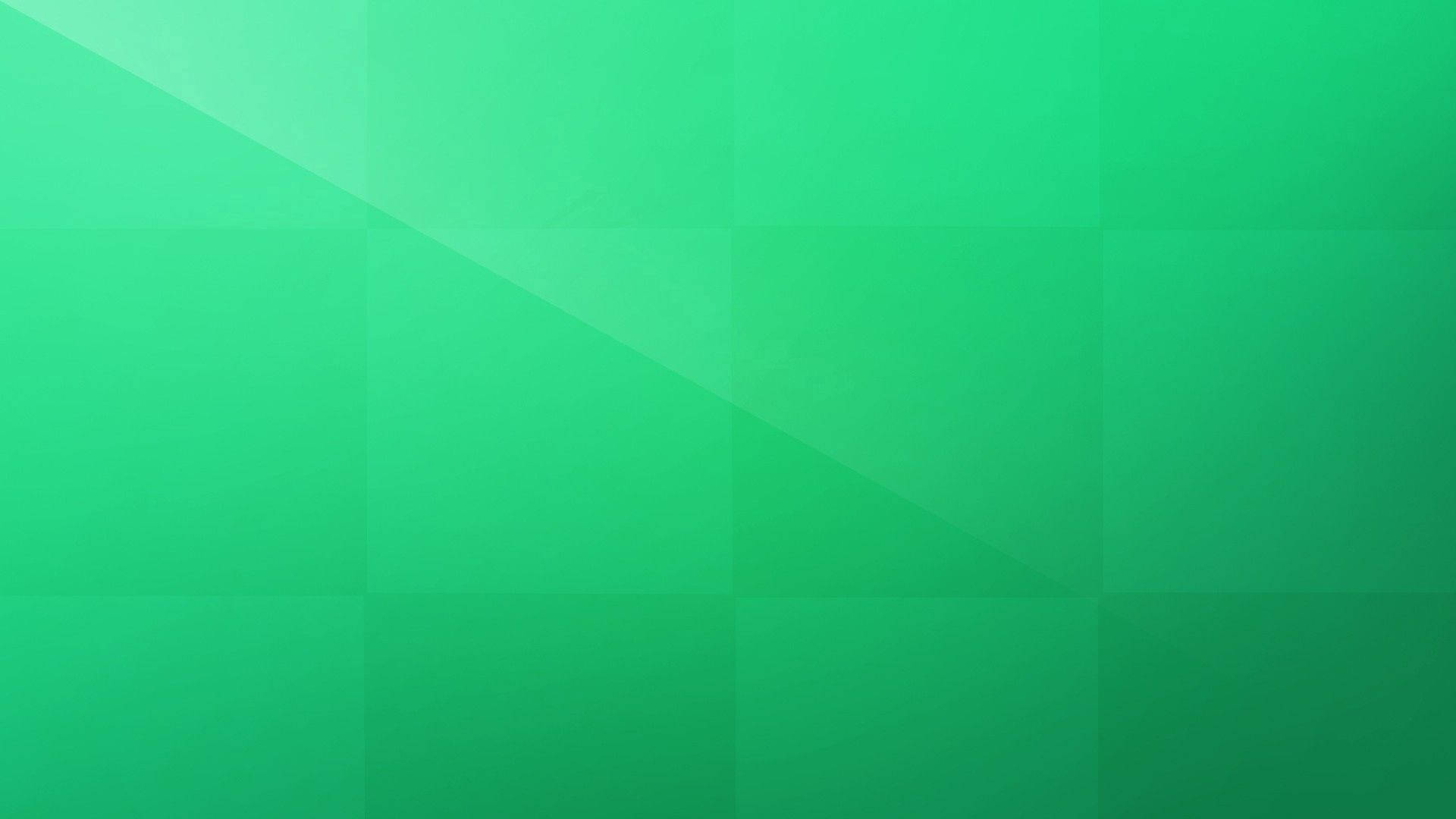 Solid 桌布 壁紙 — 舒緩的漸變綠色背景，帶有柔和的幾何陰影和微妙的光線。