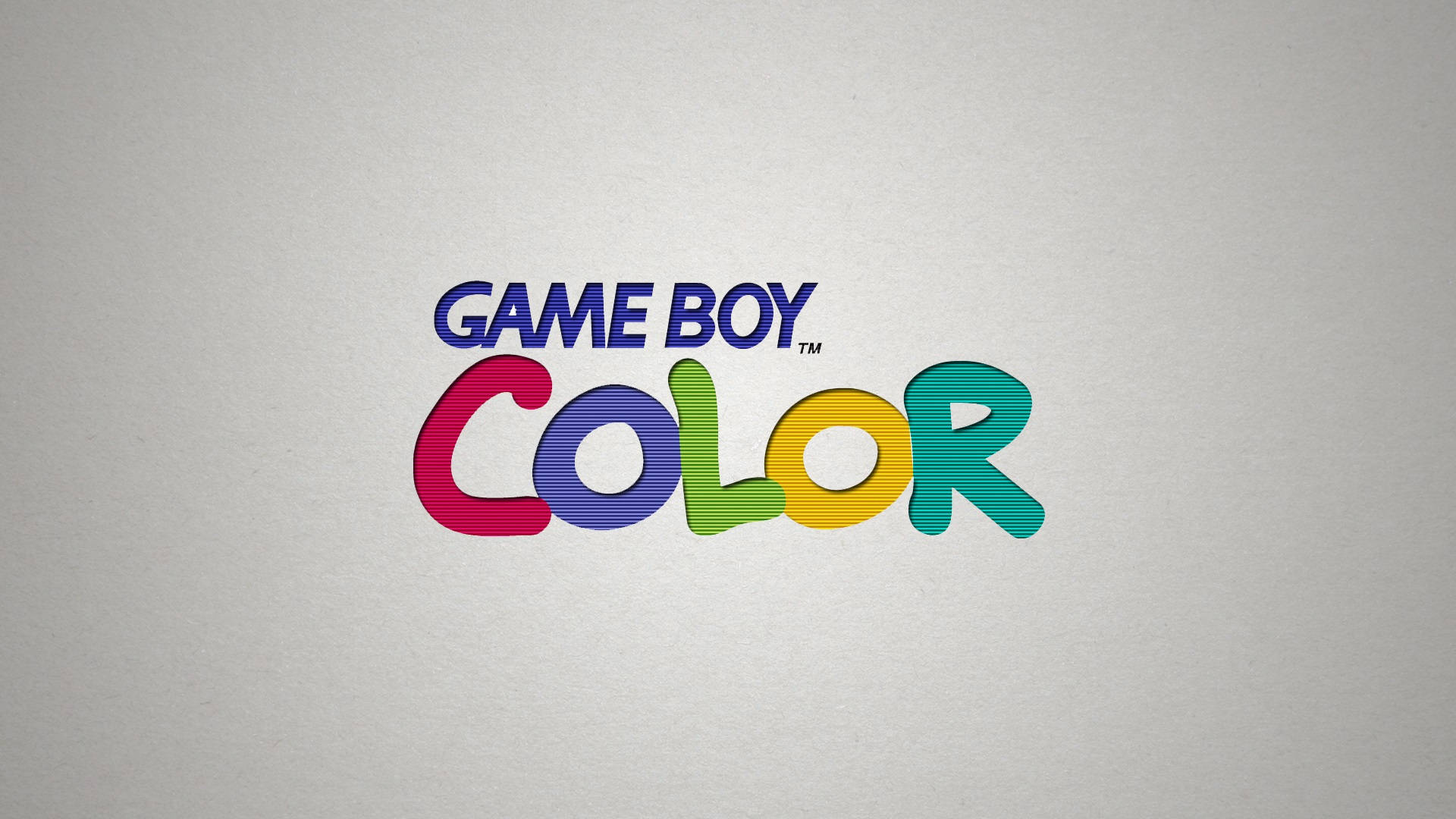 game 桌布 壁紙 — 色彩繽紛的Game Boy Color標誌在樸素的紋理灰色背景上脫穎而出。