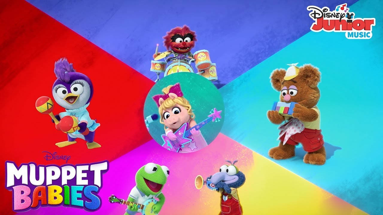 babies 桌布 壁紙 — 色彩繽紛的Muppet Babies角色在彩色幾何背景前演奏樂器。