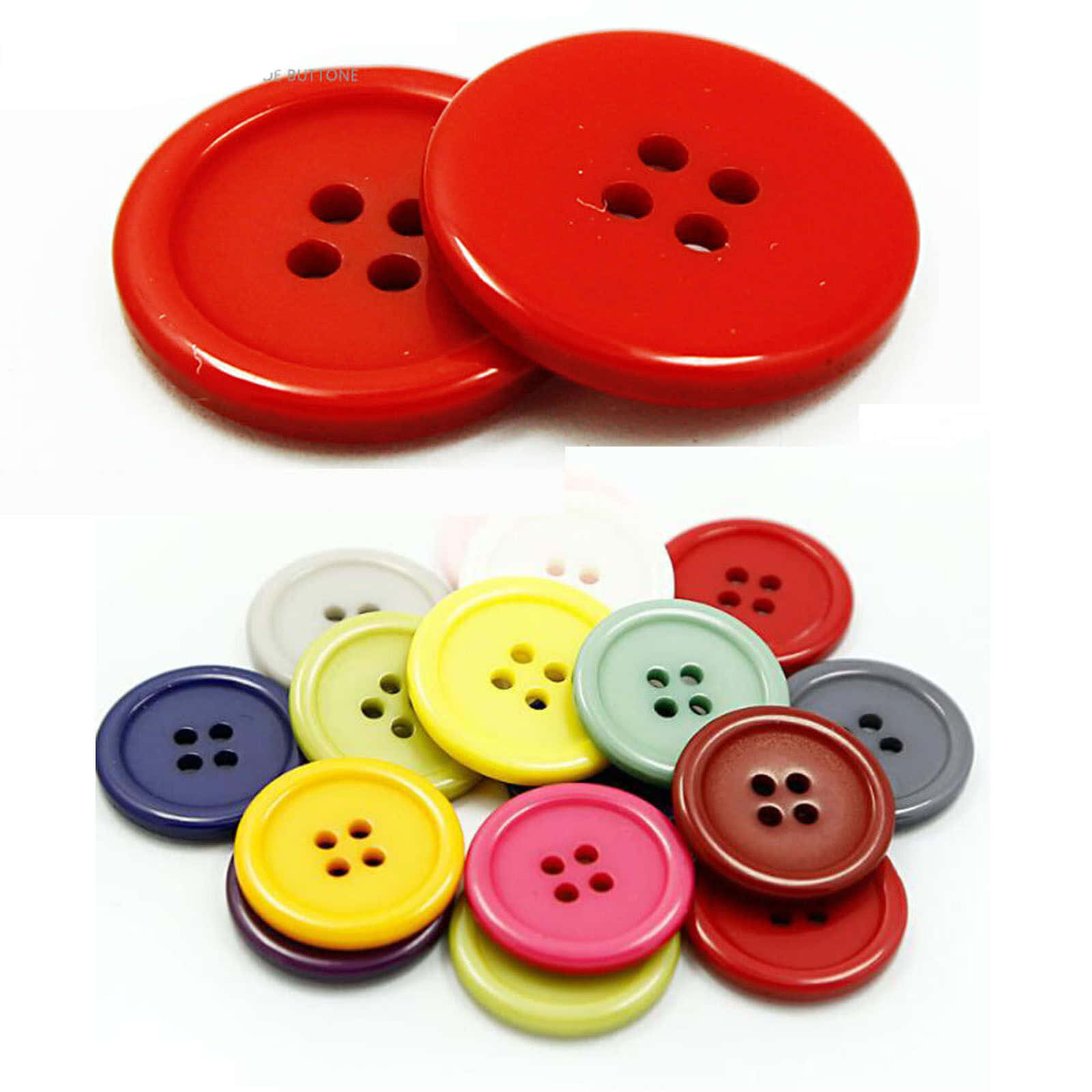 Buttons 桌布 壁紙 — 色彩繽紛的亮面塑膠鈕扣系列，包括紅色、黃色、粉紅色和藍色等多種顏色，排列在潔淨的白色背景上。