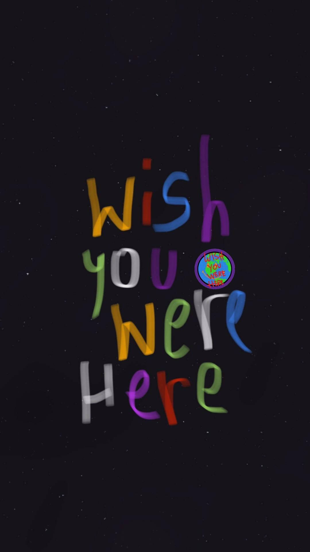 崔維斯·史考特 桌布 壁紙 — 色彩繽紛的彩虹色文字 'Wish you were here' 漂浮在星空夜空背景上。
