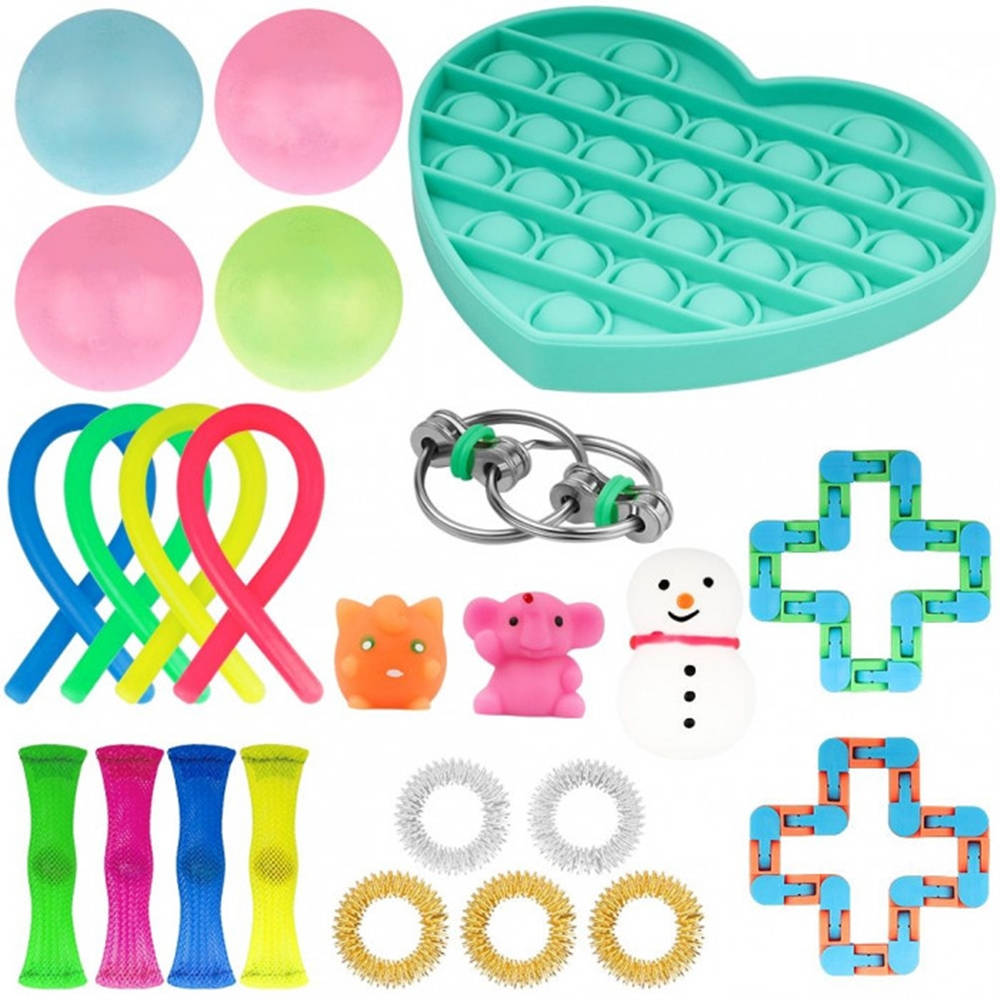 Shapes 桌布 壁紙 — 色彩繽紛的減壓玩具系列，包括按壓玩具、減壓球、感官環和可彎曲玩具，整齊地排列在白色背景上。