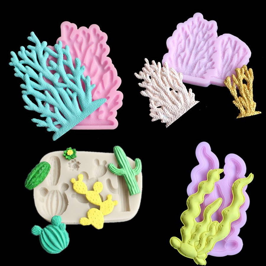 coral 桌布 壁紙 — 色彩繽紛的珊瑚和仙人掌矽膠模具排列在黑色背景上，適合手工製作。