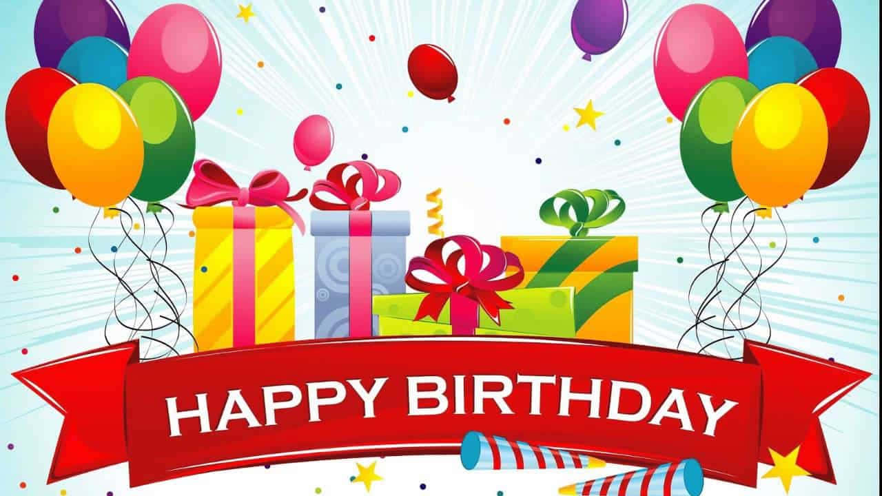 Birthday 桌布 壁紙 — 色彩繽紛的生日慶祝活動，彩色氣球、禮物和五彩紙屑從一個紅色橫幅中散發出來，橫幅上寫著生日快樂。