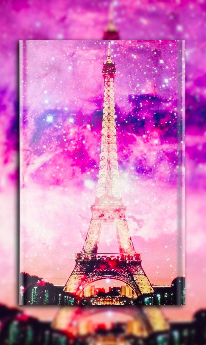 Eiffel Tower 桌布 壁紙 — 艾菲爾鐵塔在充滿閃爍星星的鮮豔粉紅色和紫色宇宙天空下高高聳立。