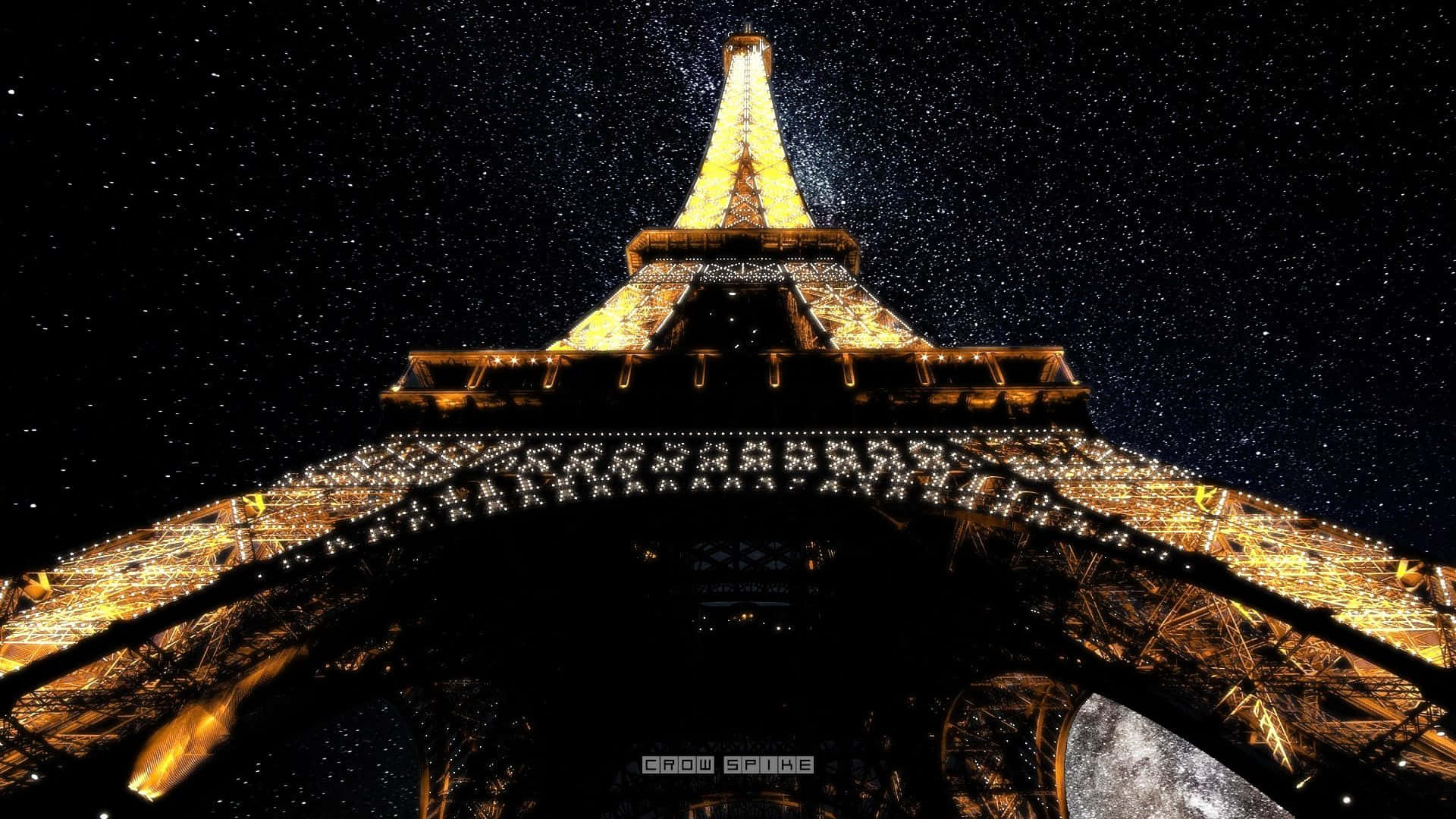 Eiffel Tower 桌布 壁紙 — 艾菲爾鐵塔在繁星點點的夜空下閃耀著金色燈光，可見一彎新月。