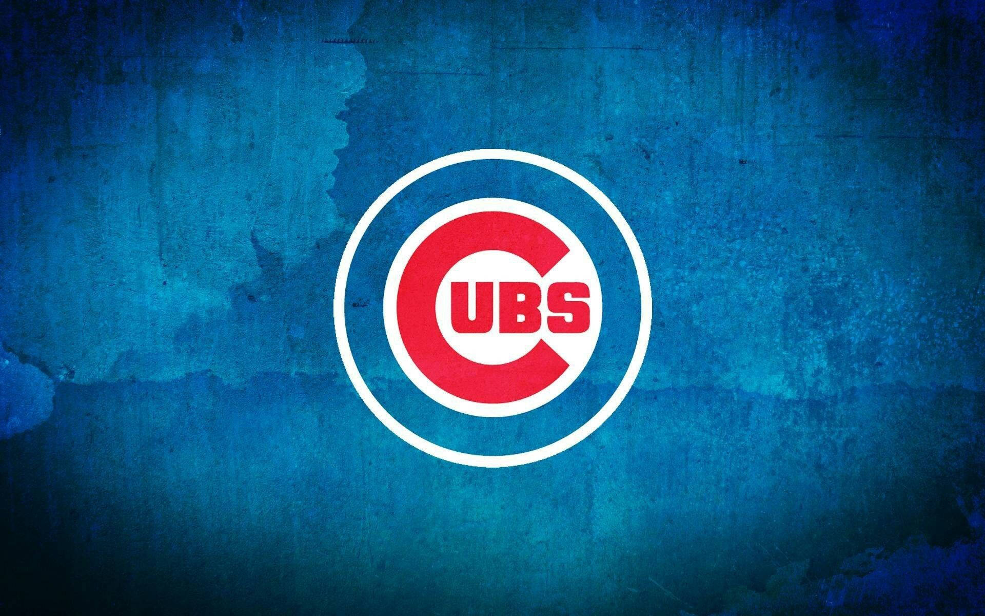 Cubs 桌布 壁紙 — 芝加哥小熊隊標誌，紅白藍色，帶紋理藍色背景。