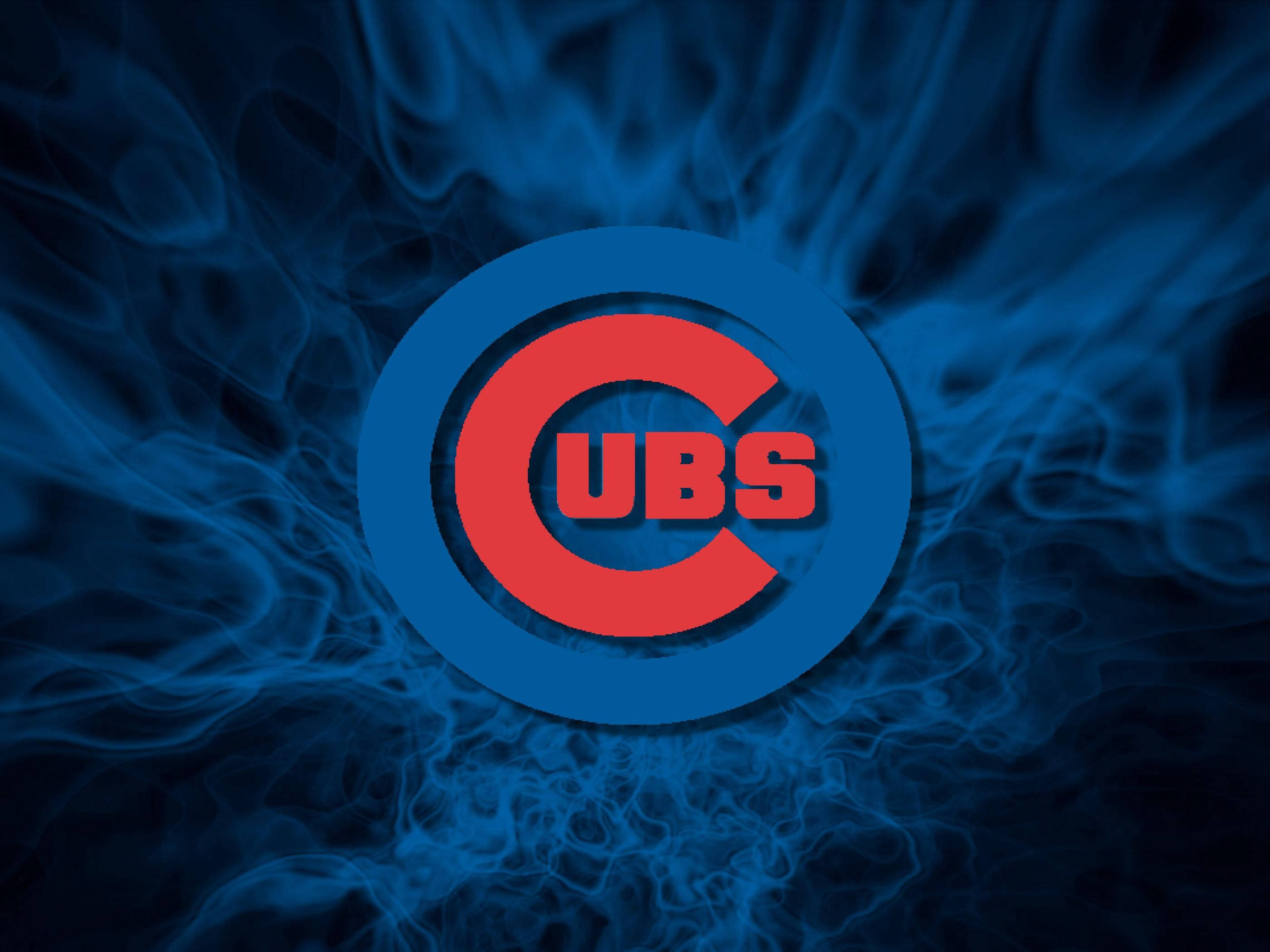 Cubs 桌布 壁紙 — 芝加哥小熊隊標誌以鮮明的紅色和藍色居中，背景為旋轉的深藍色煙霧。