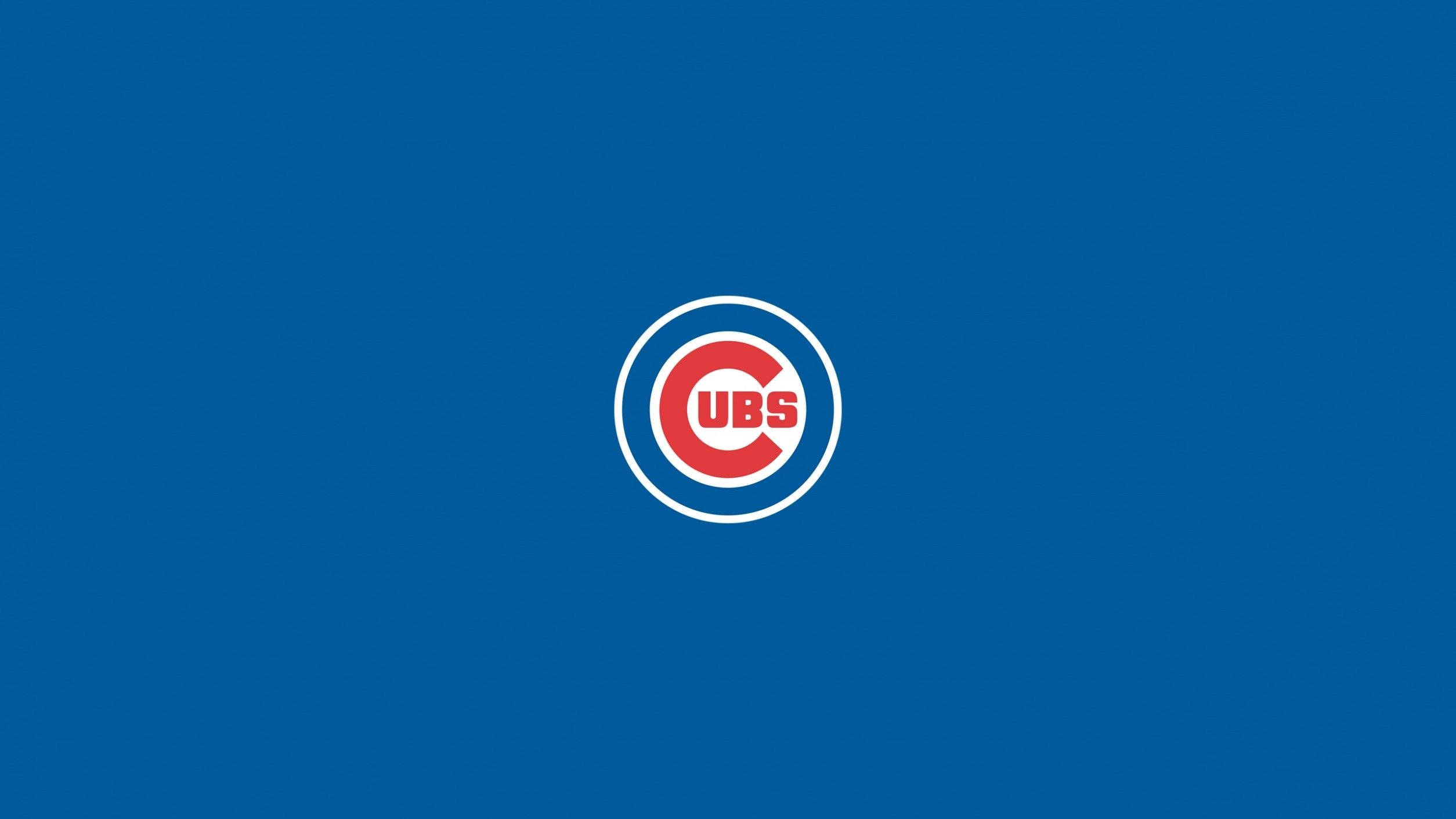 Cubs 桌布 壁紙 — 芝加哥小熊隊標誌居中於純藍色背景上，採用粗體紅白藍色。