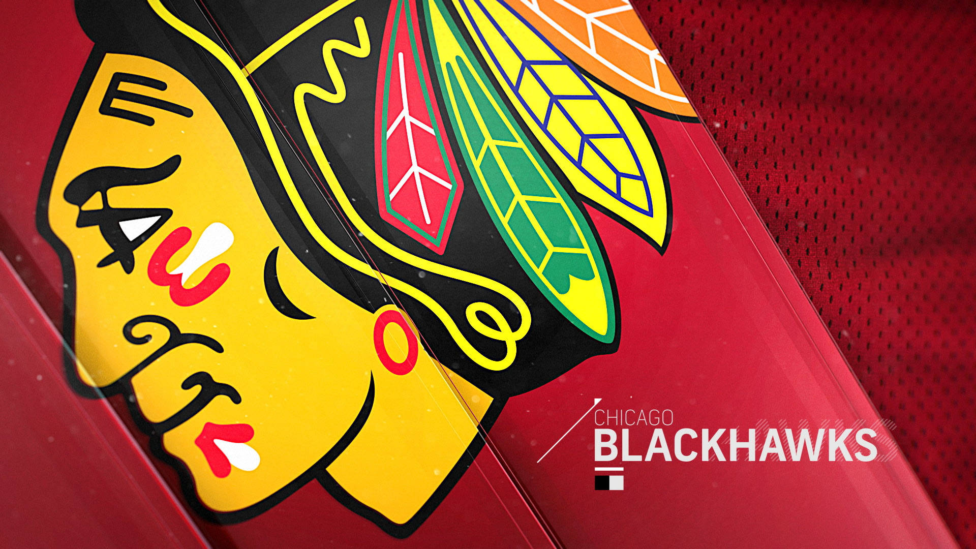 Blackhawks 桌布 壁紙 — 芝加哥黑鷹隊標誌特寫，位於紅色冰球球衣布料上，色彩鮮明，羽毛細節精緻。