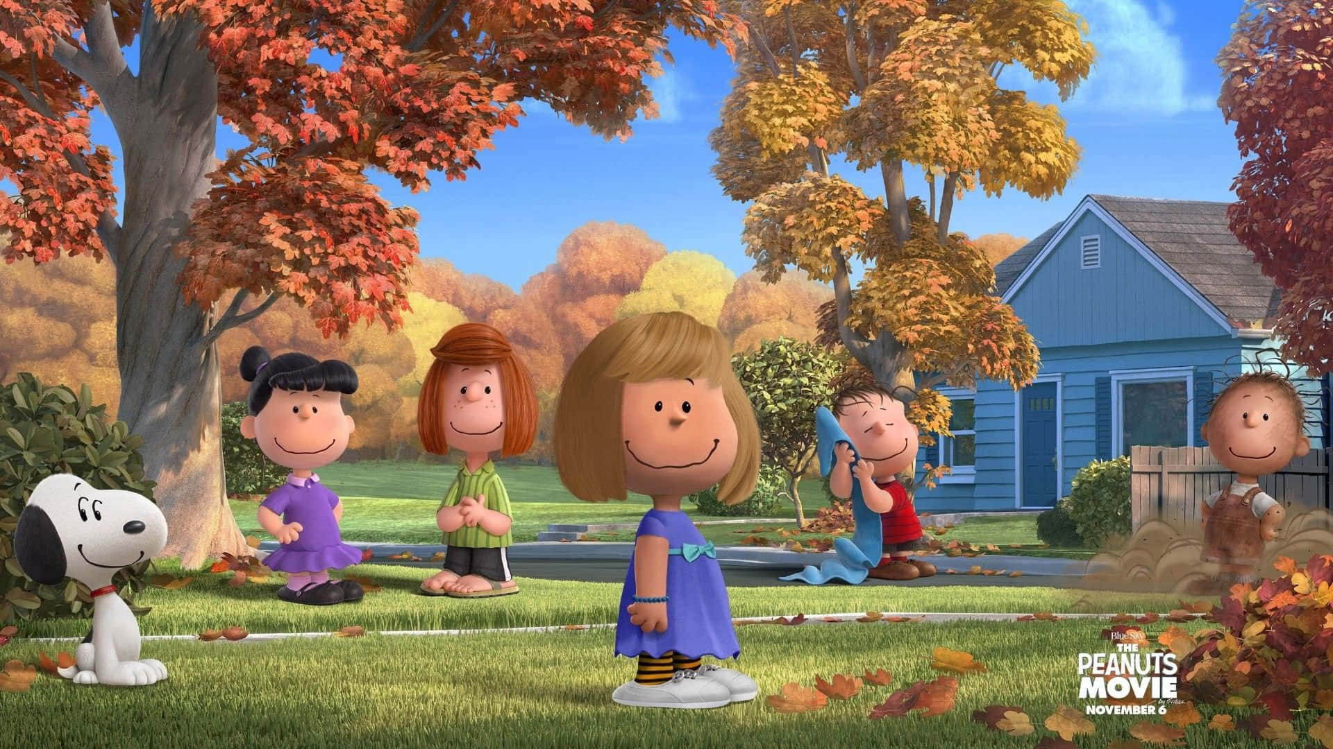 Snoopy Fall 桌布 壁紙 — 花生漫畫角色們聚集在秋天的公園裡，有色彩繽紛的樹木和藍色房子，天空明亮。
