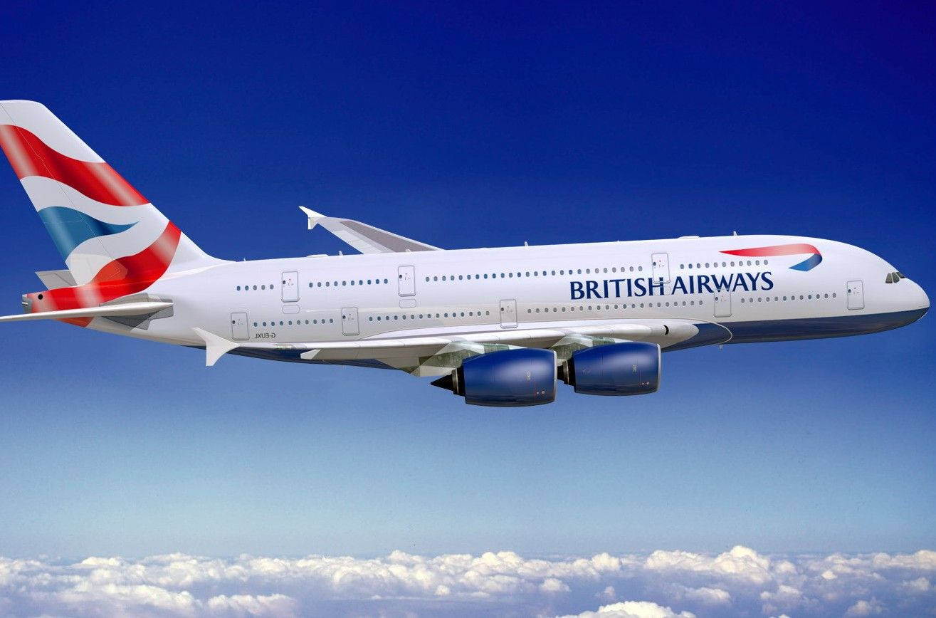 飛機 桌布 壁紙 — 英國航空的空中巴士A380在深藍色的天空中翱翔於蓬鬆的白雲之上。