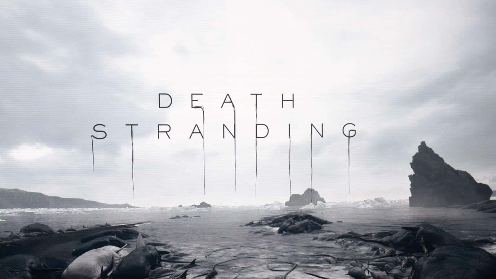 Death Stranding Pc 桌布 壁紙 — 荒涼的灰色海岸線，崎嶇的岩石，標題「DEATH STRANDING」在暴風雨的天空下以純白色滴落。