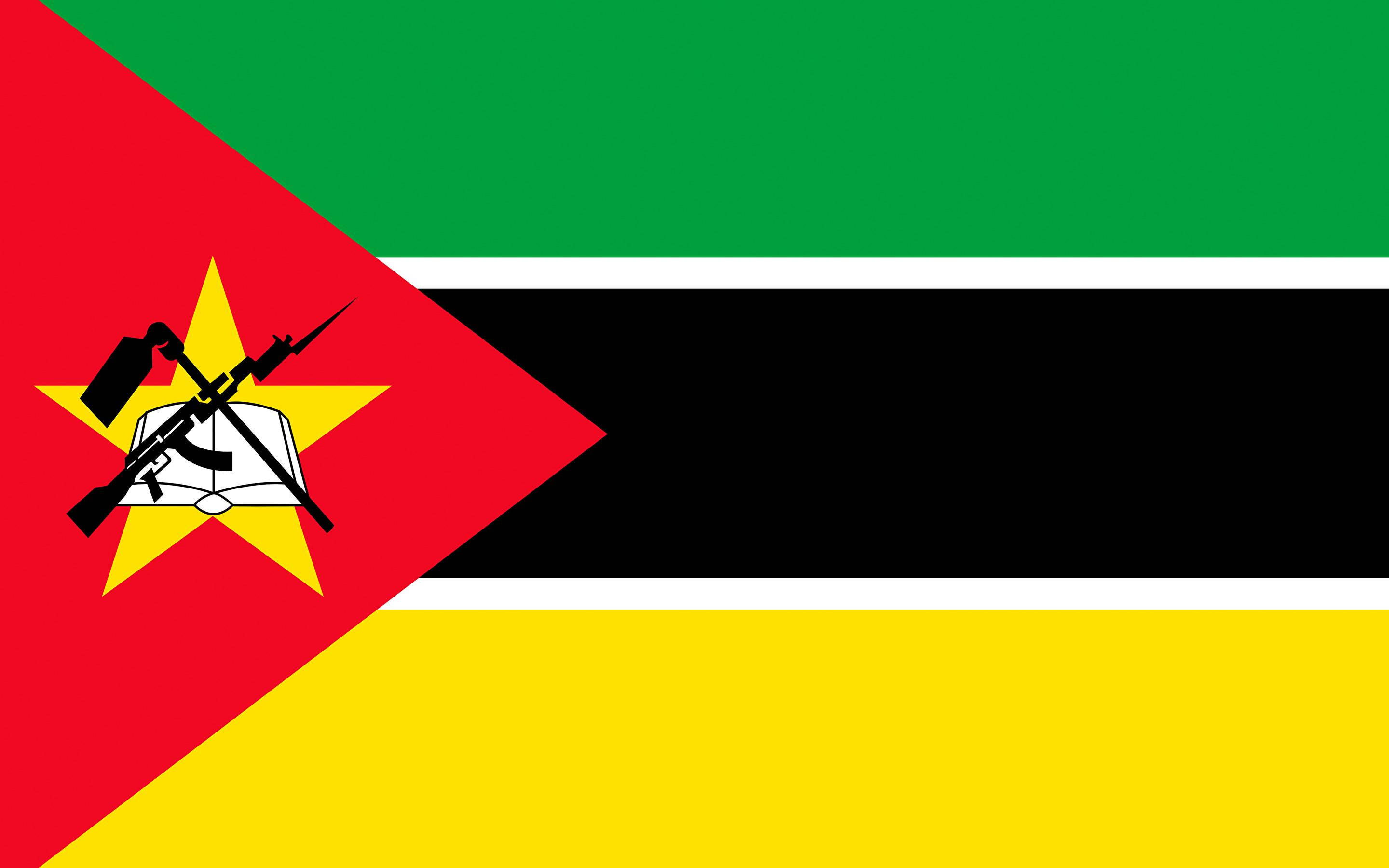 Mozambique 桌布 壁紙 — 莫三比克國旗有綠色、黃色、黑色和白色條紋，以及一個包含黃色星星和交叉符號的紅色三角形。