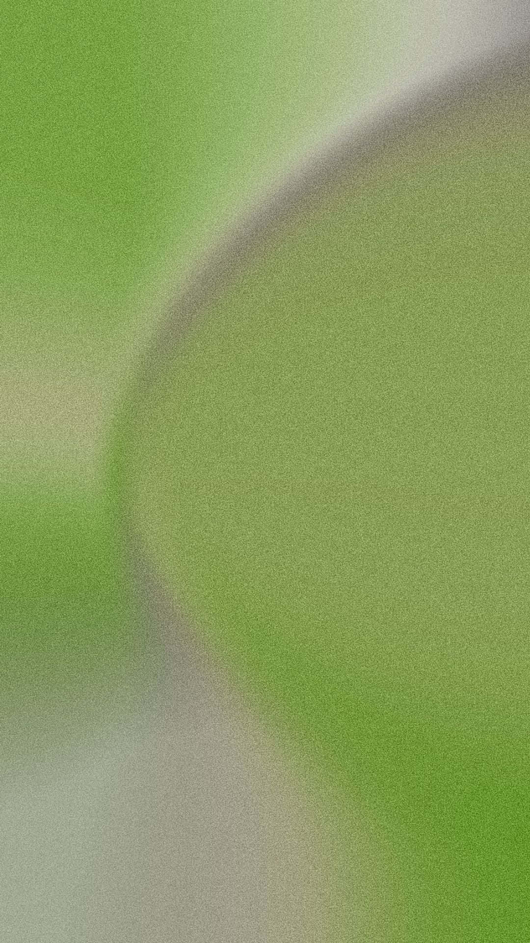 Green Gradient 桌布 壁紙 — 萊姆綠色和淡灰色的柔和漸變，帶有模糊的彎曲形狀，營造出平靜的抽象背景。