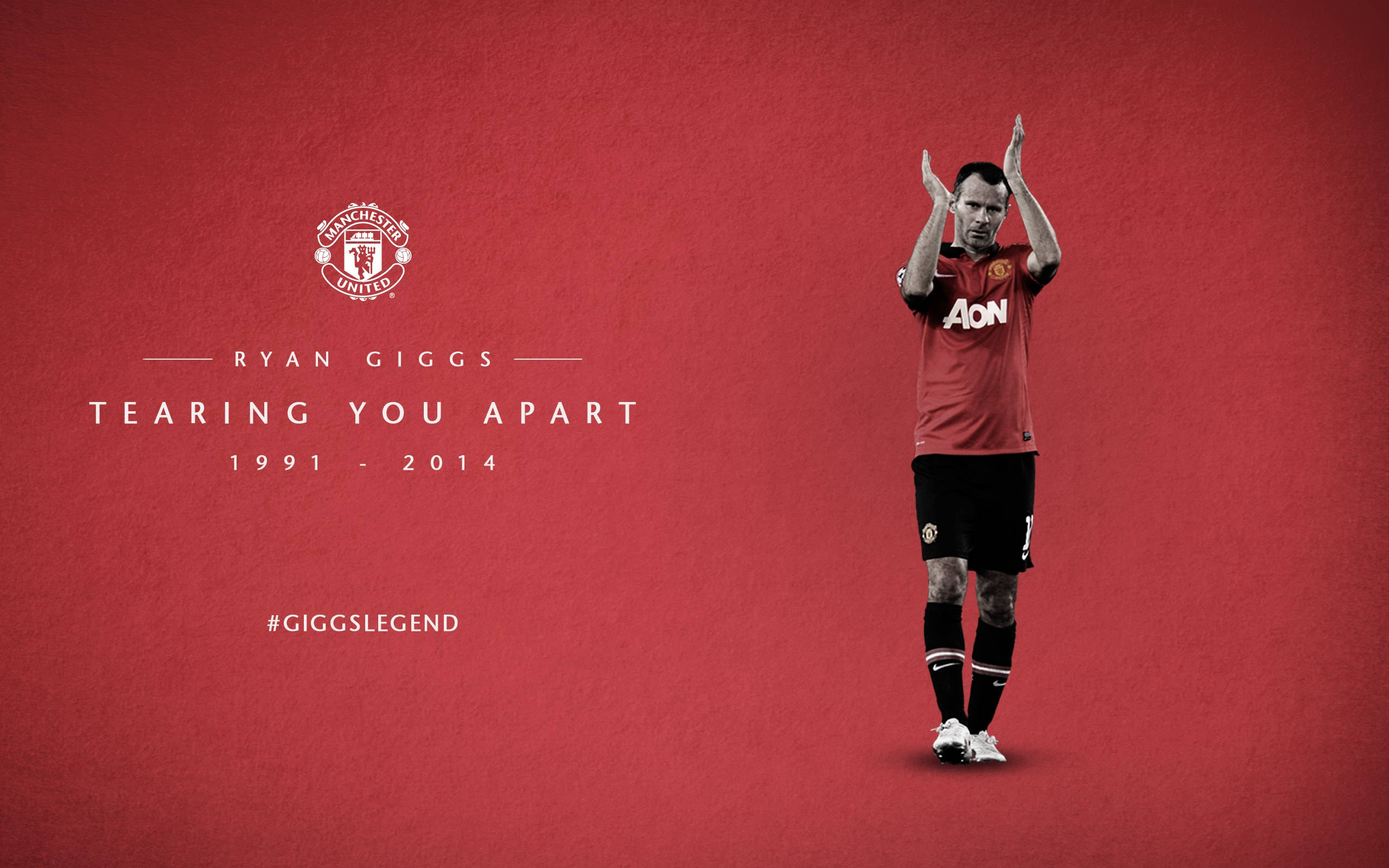 Ryan Giggs 桌布 壁紙 — 萊恩·吉格斯穿著紅色曼聯球衣，在純紅色紋理背景上鼓掌，背景上有球隊標誌和職業年份文字。