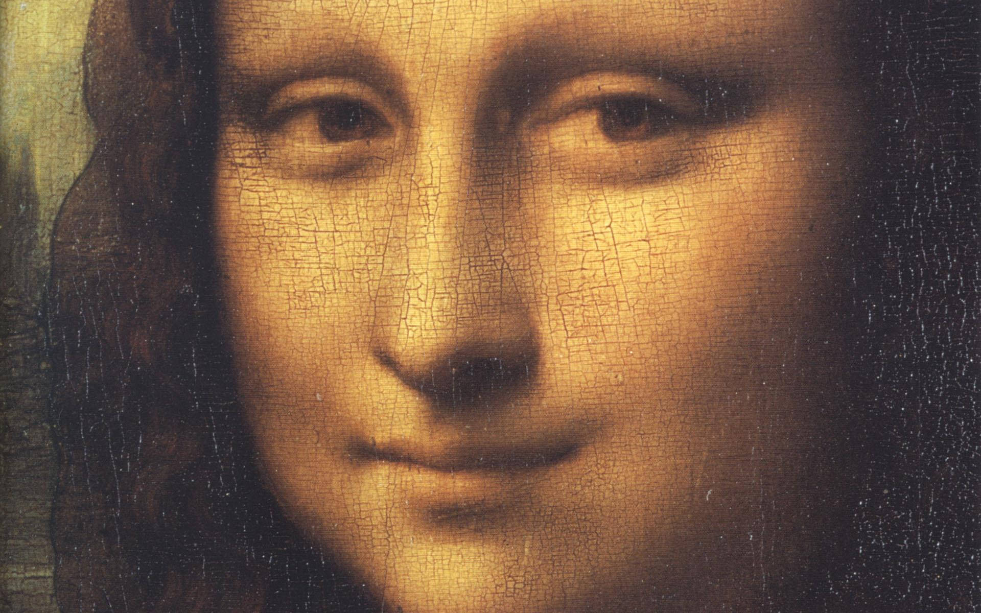 lisa 桌布 壁紙 — 蒙娜麗莎神秘面部的特寫，帶有龜裂的金棕色顏料和柔和的陰影背景。