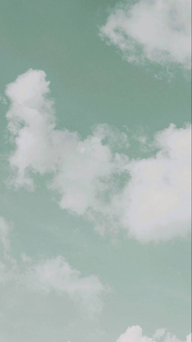 薄荷綠iPhone上的雲朵 壁紙