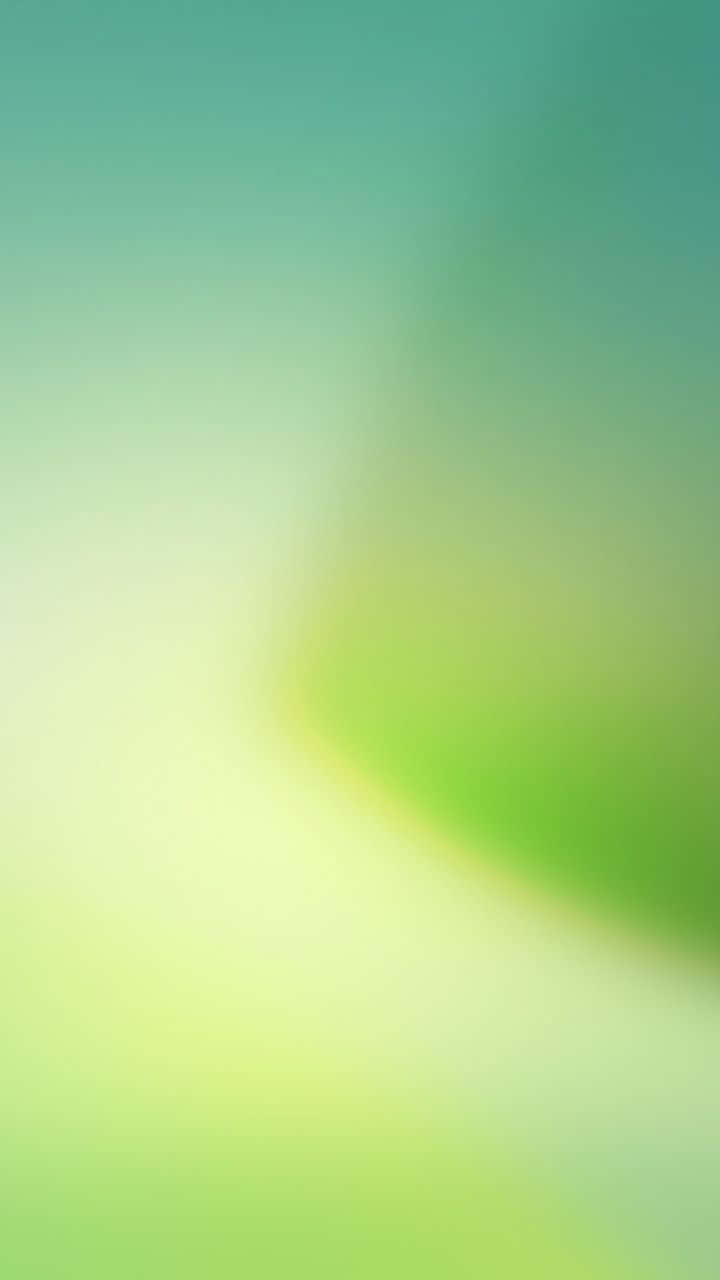 720x1280 桌布 壁紙 — 薄荷綠和淡黃色的柔和漸變，營造出平靜的抽象背景。