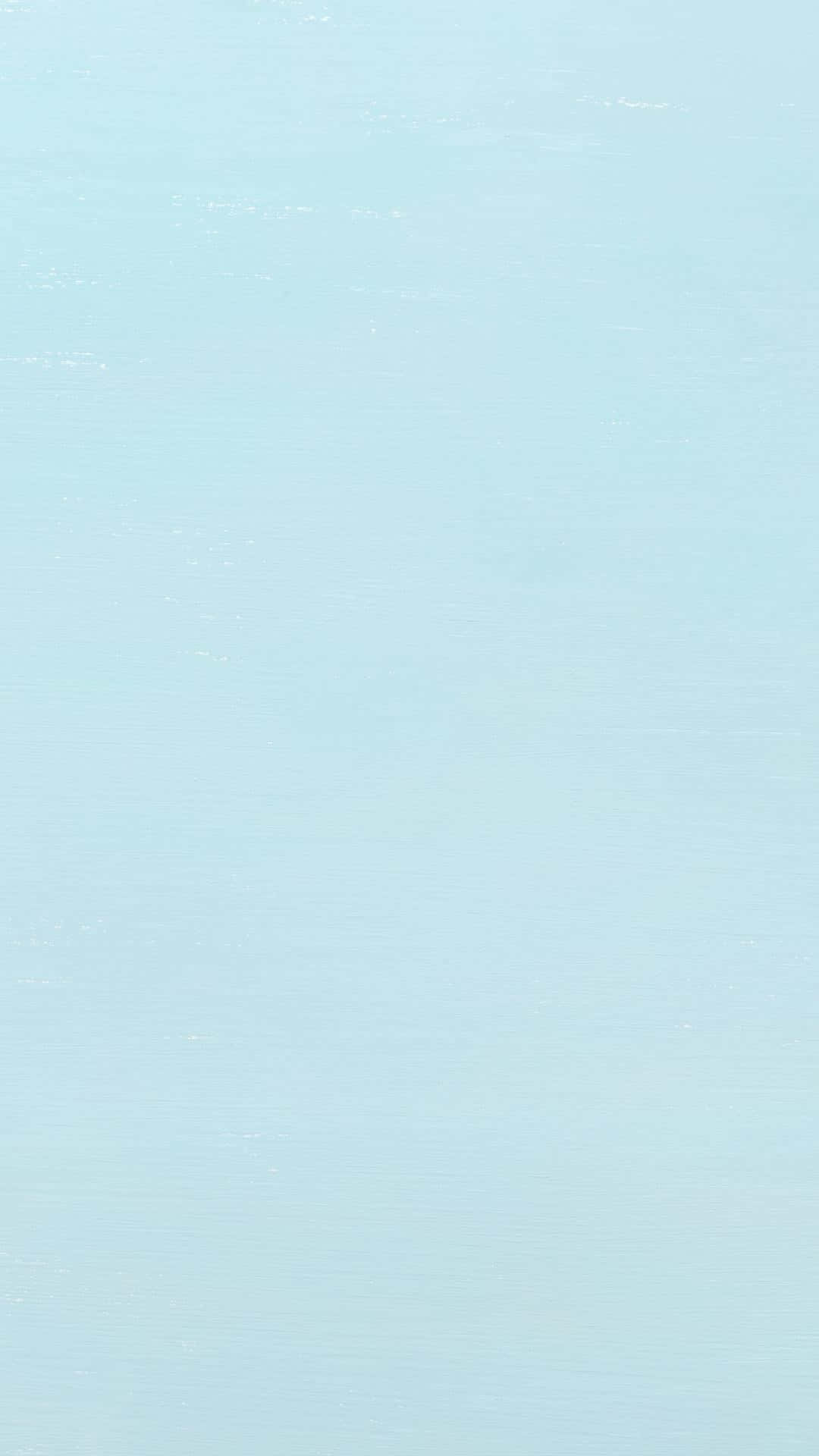 藍天背景中的一艘小船 壁紙