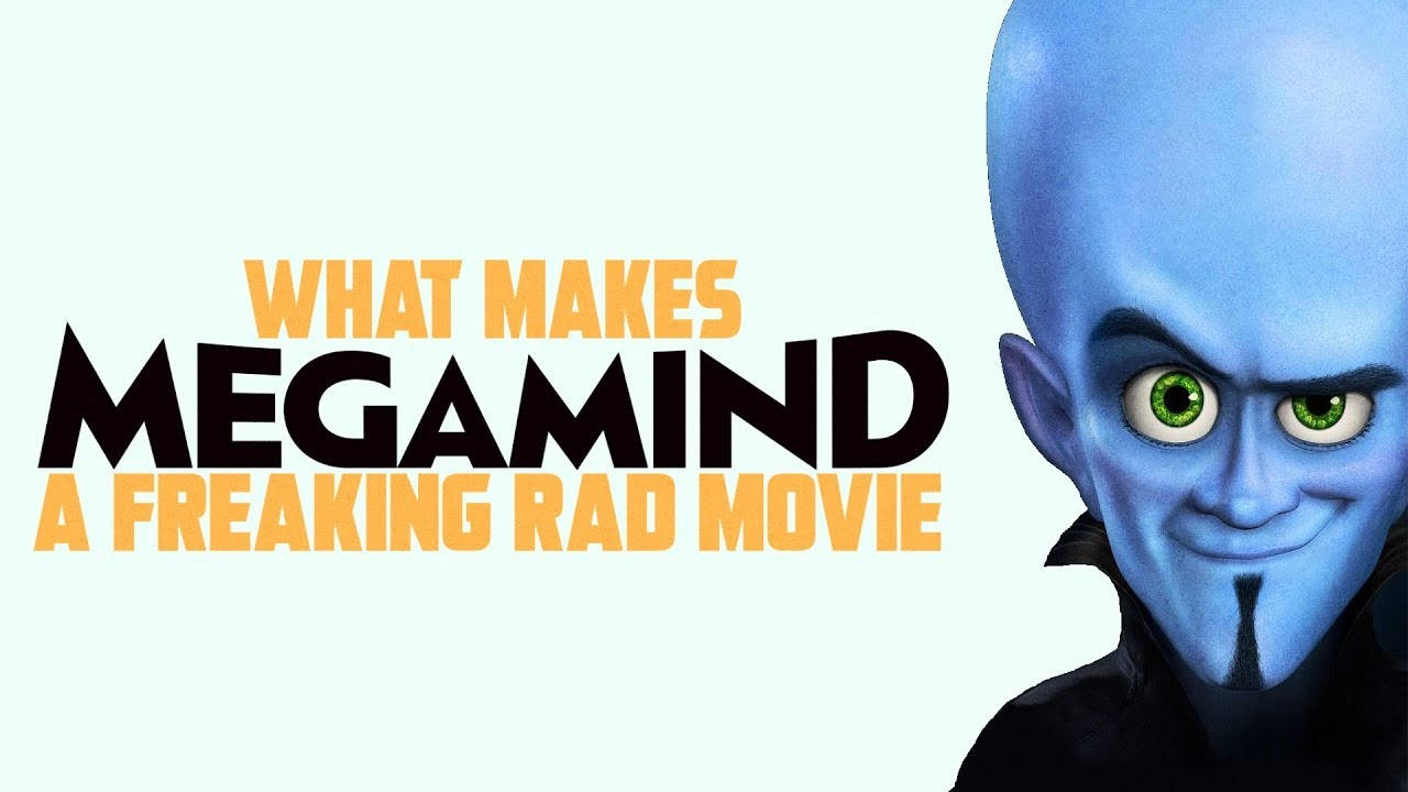藍皮膚動畫反派 Megamind 綠色眼睛，在電影標題文字旁邊冷笑。 — 外星人 GIF 壁紙