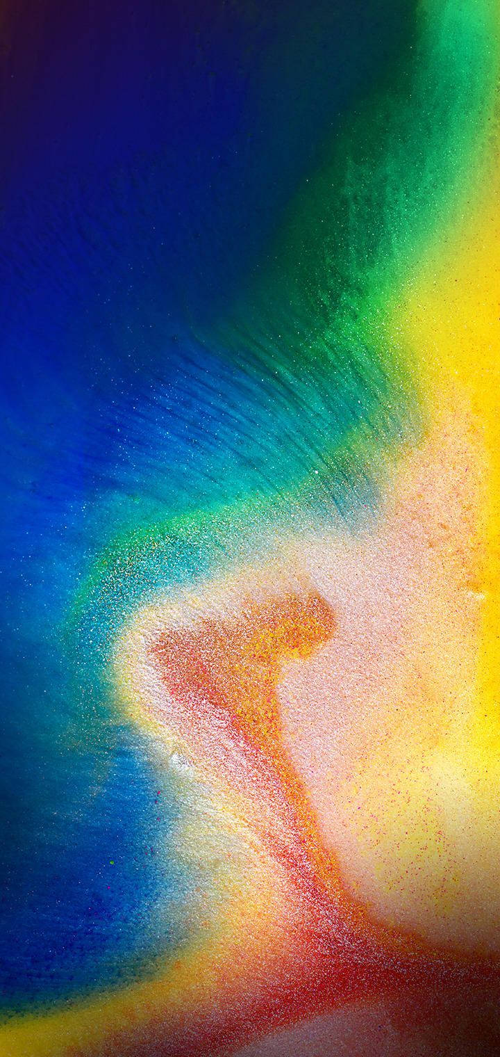 Colorful iPhone 桌布 壁紙 — 藍色、綠色、黃色和橙色的鮮豔抽象漩渦在閃爍的紋理漸變中融合。